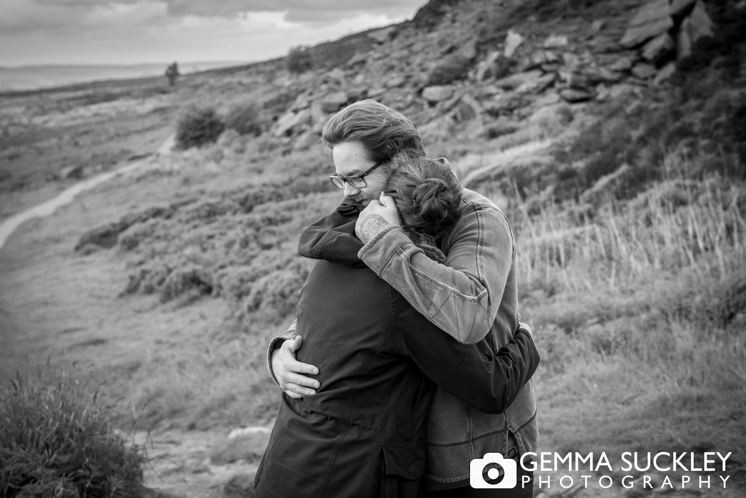 intimate photo of a couple hugging during their engagement shoot
