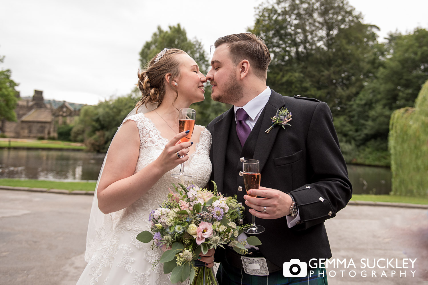 bride and groom exciting east riddlesden barn 