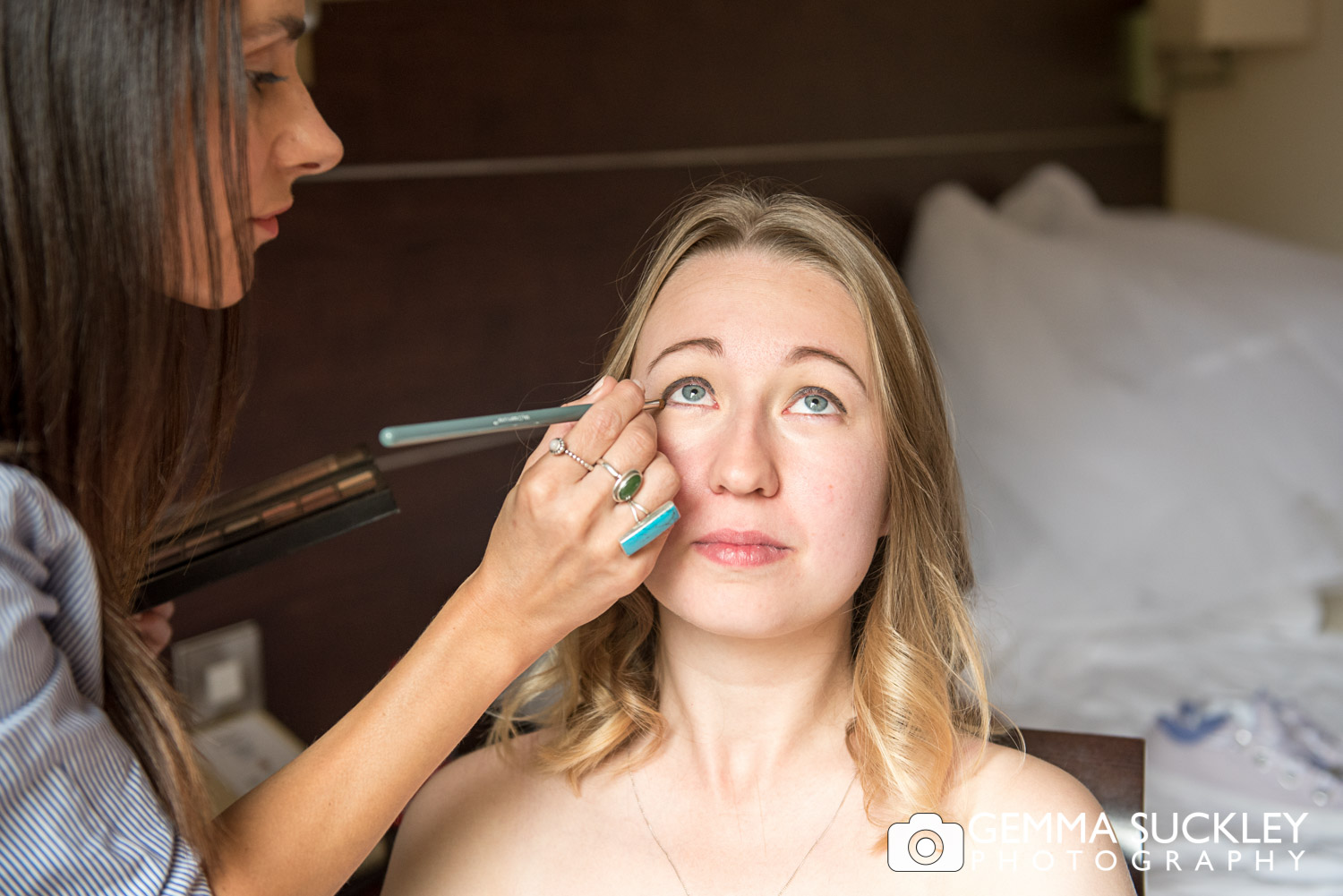 bride having her make-up done at mercure hotel
