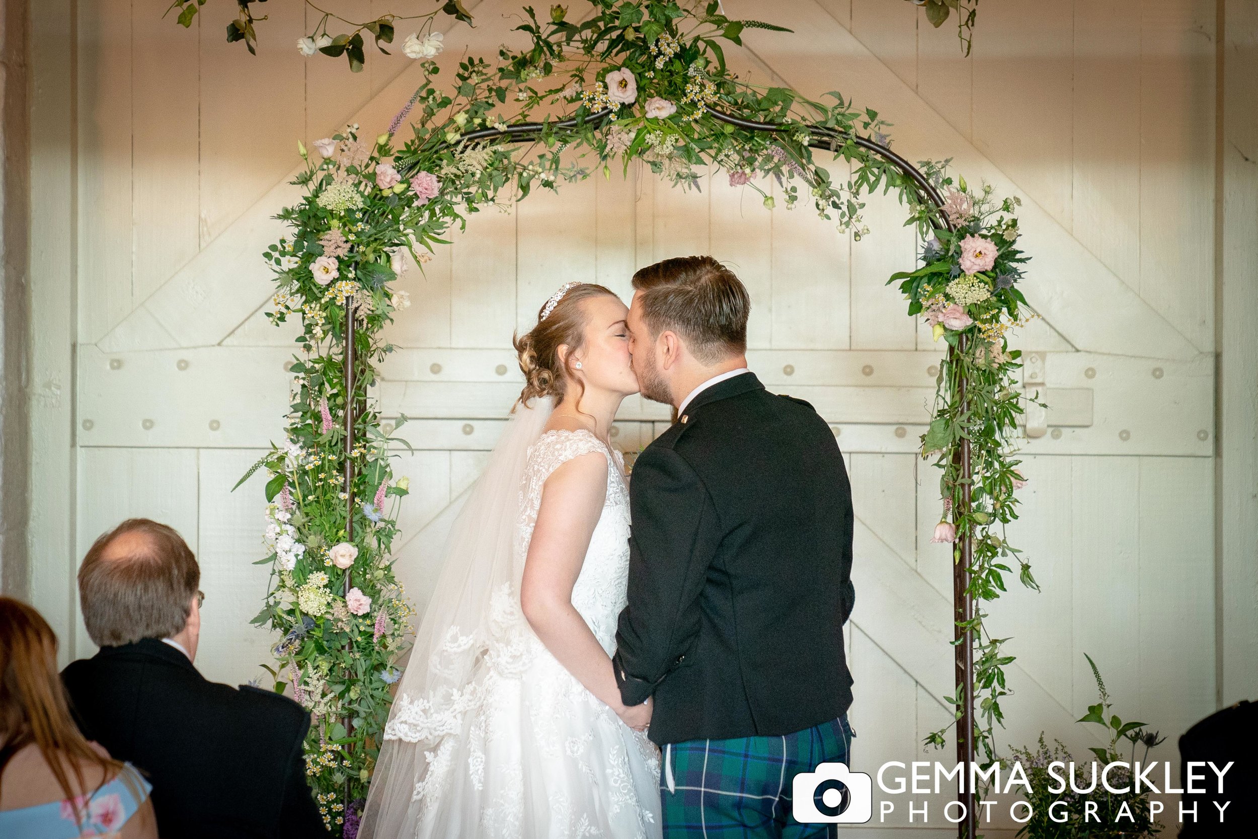 bride and groom just married at east riddlesden hall