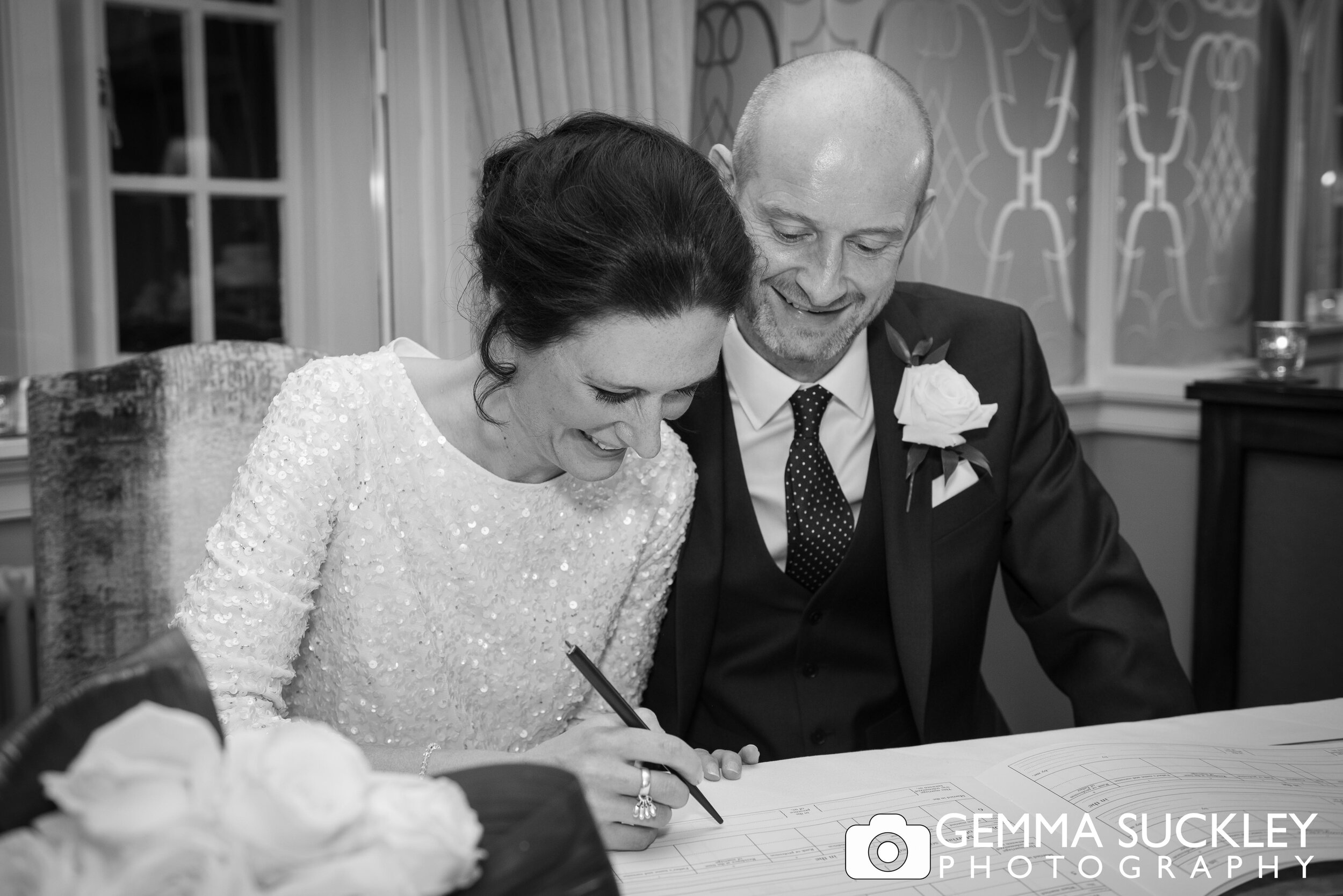 Yorkshire bride signing the registrar  