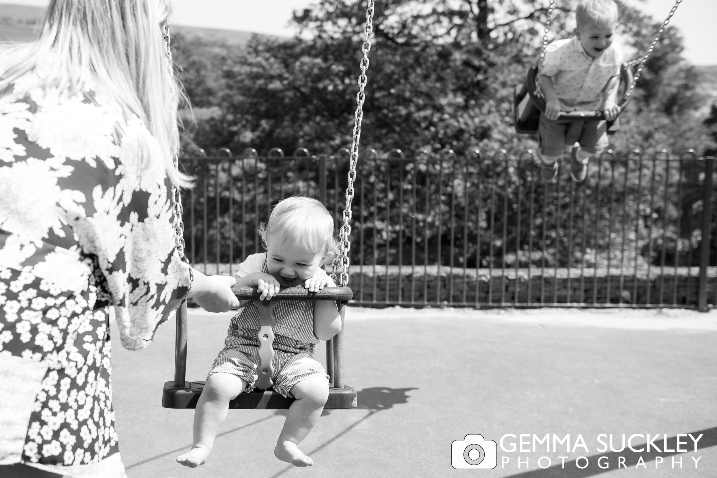 children on the swings at cliff castle park
