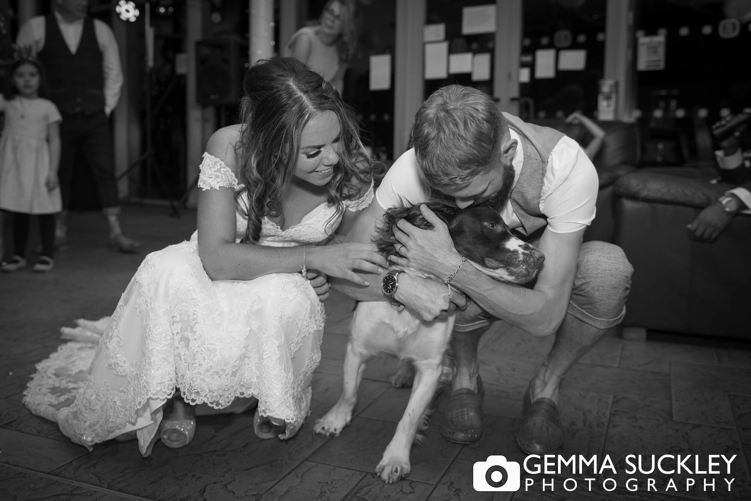 bride and groom with their dog at coffee culture in halifax