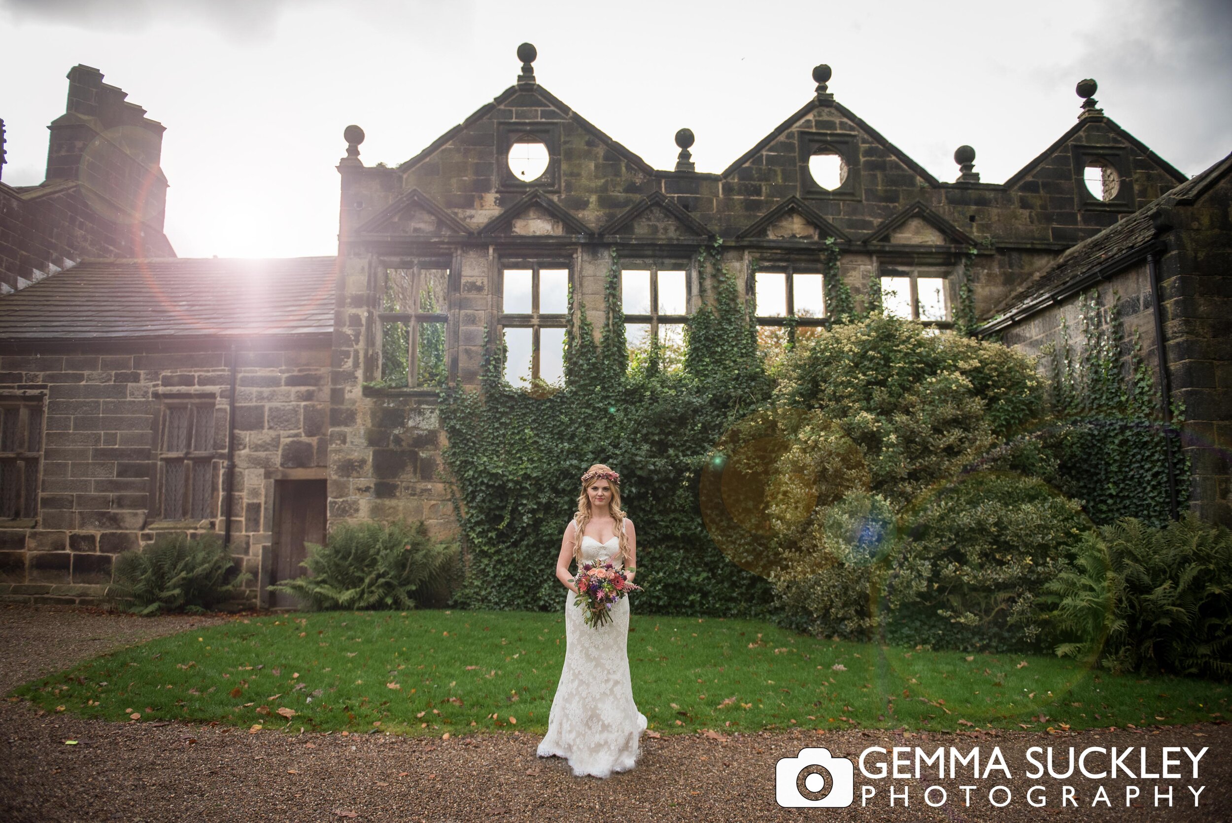 lens flare photo of bride at east riddlesden hall