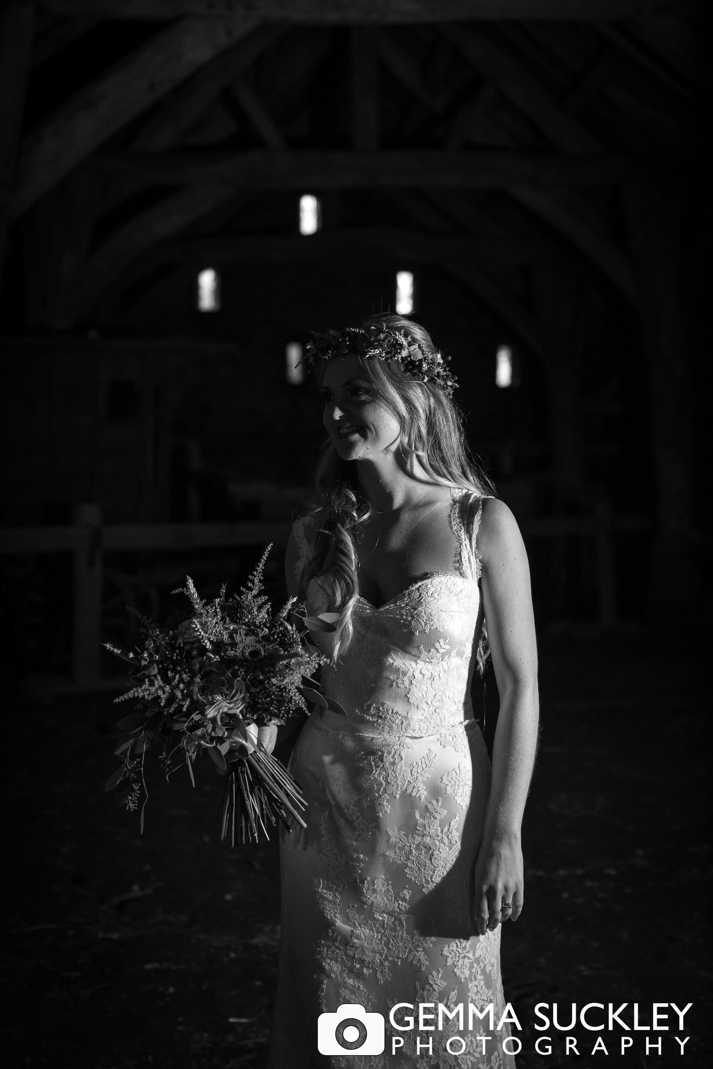 bride photographed in the great barn at east riddlesden hall