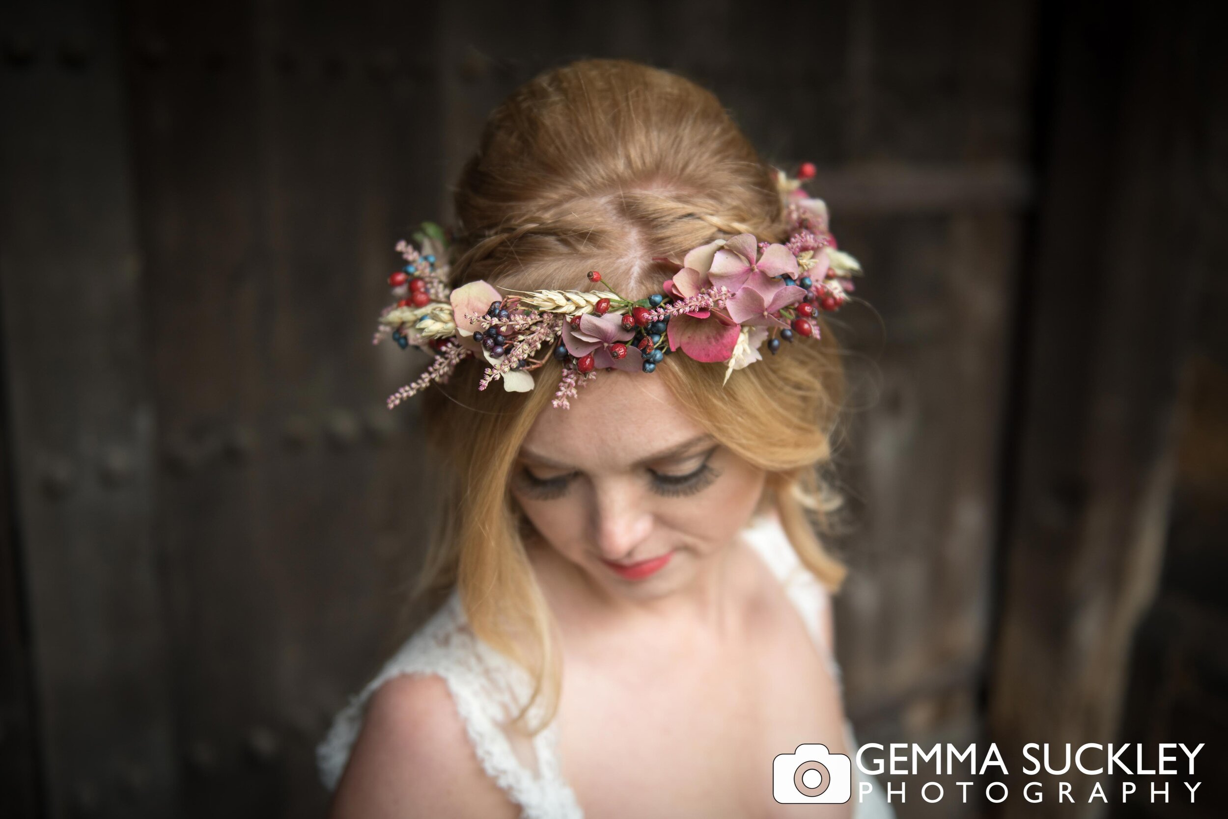 close up photo of a bride with a floral crown