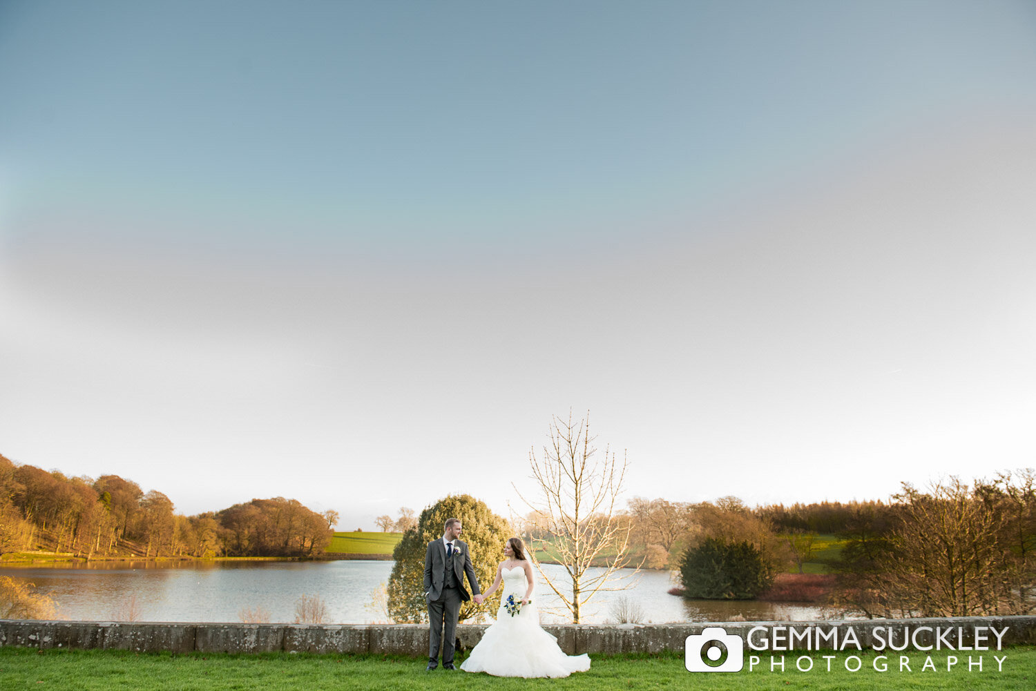 bride and groom by the lake at coniston hotel