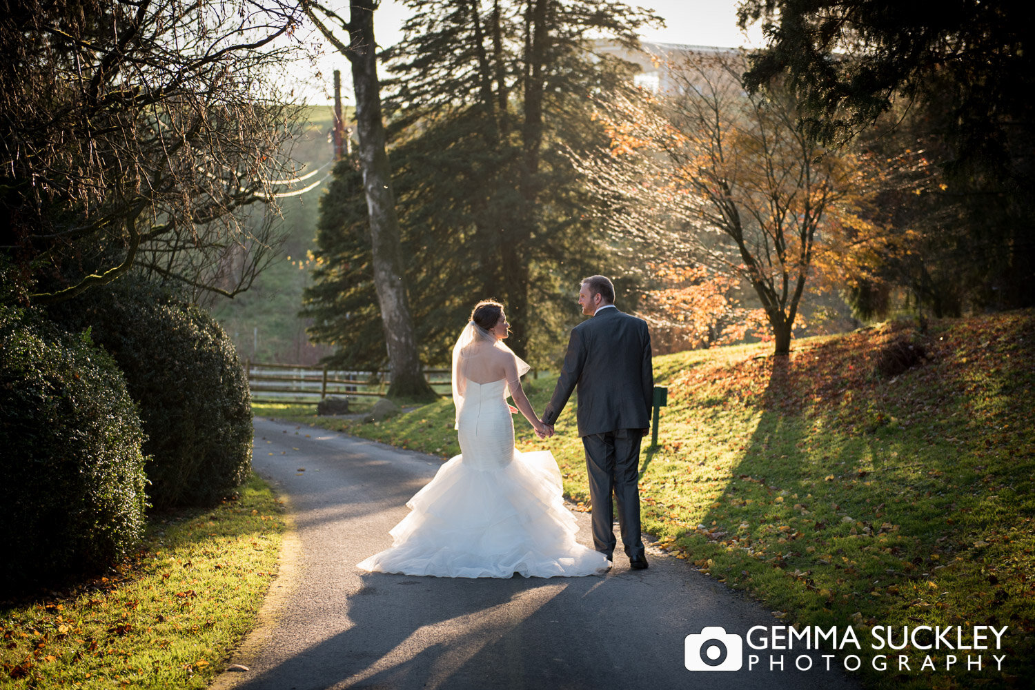 just married couple at coniston hotel in the winter sun
