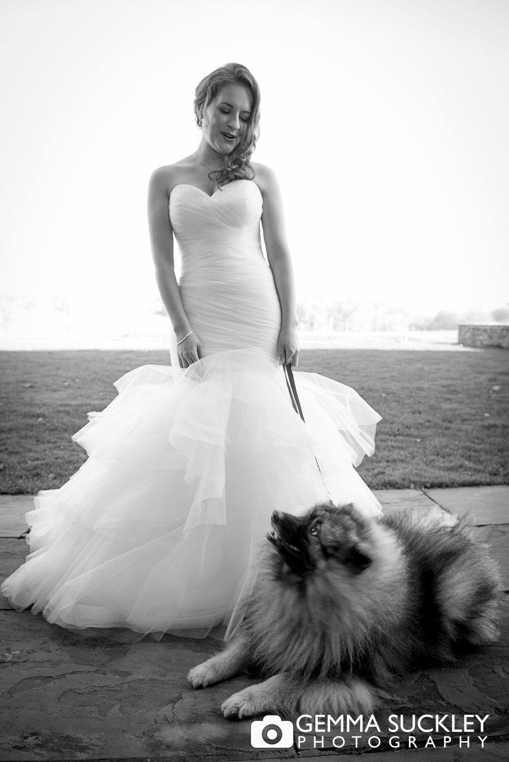 bride with her dog at outside coniston hotel