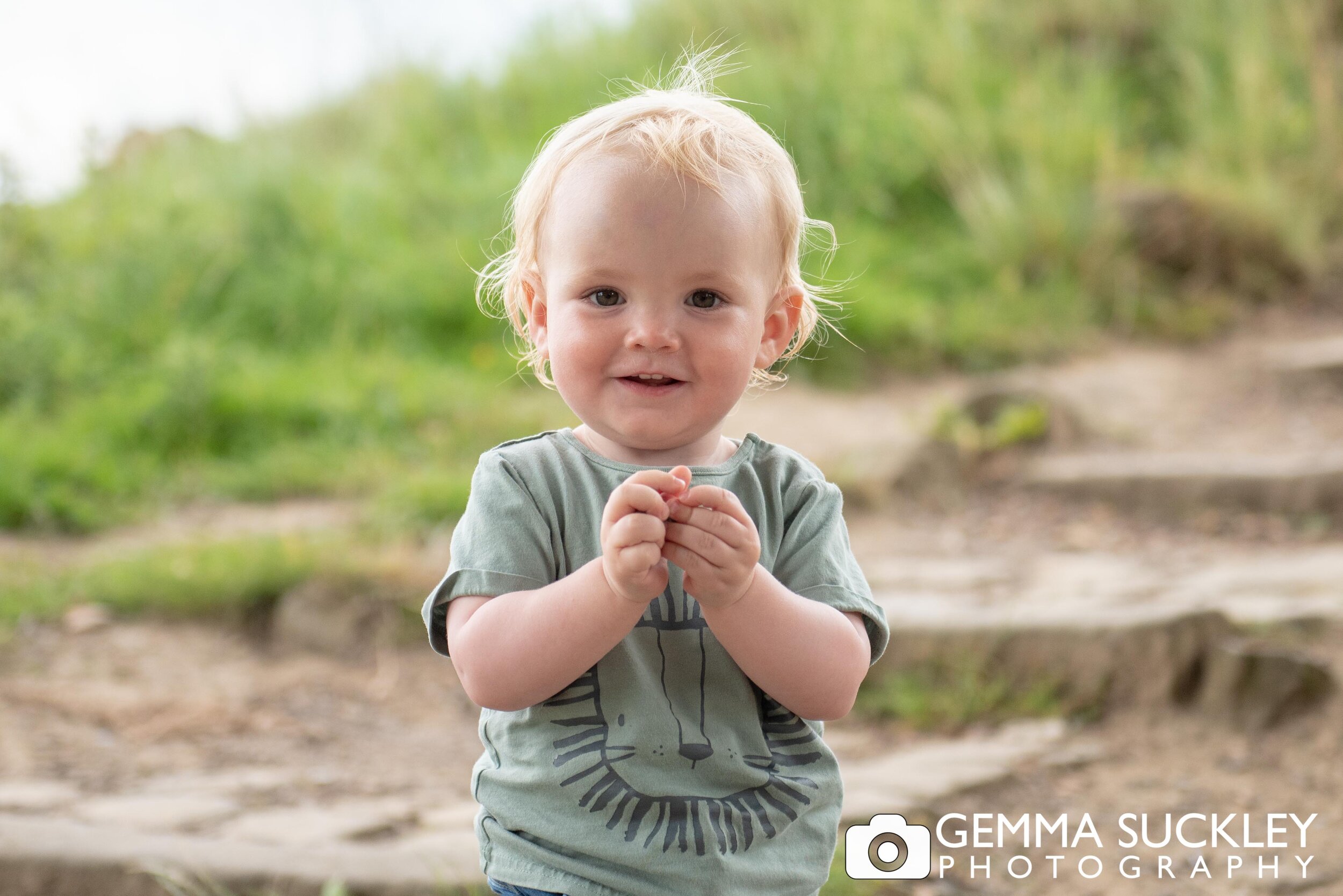 a portrait of a little boy on ilkley moor