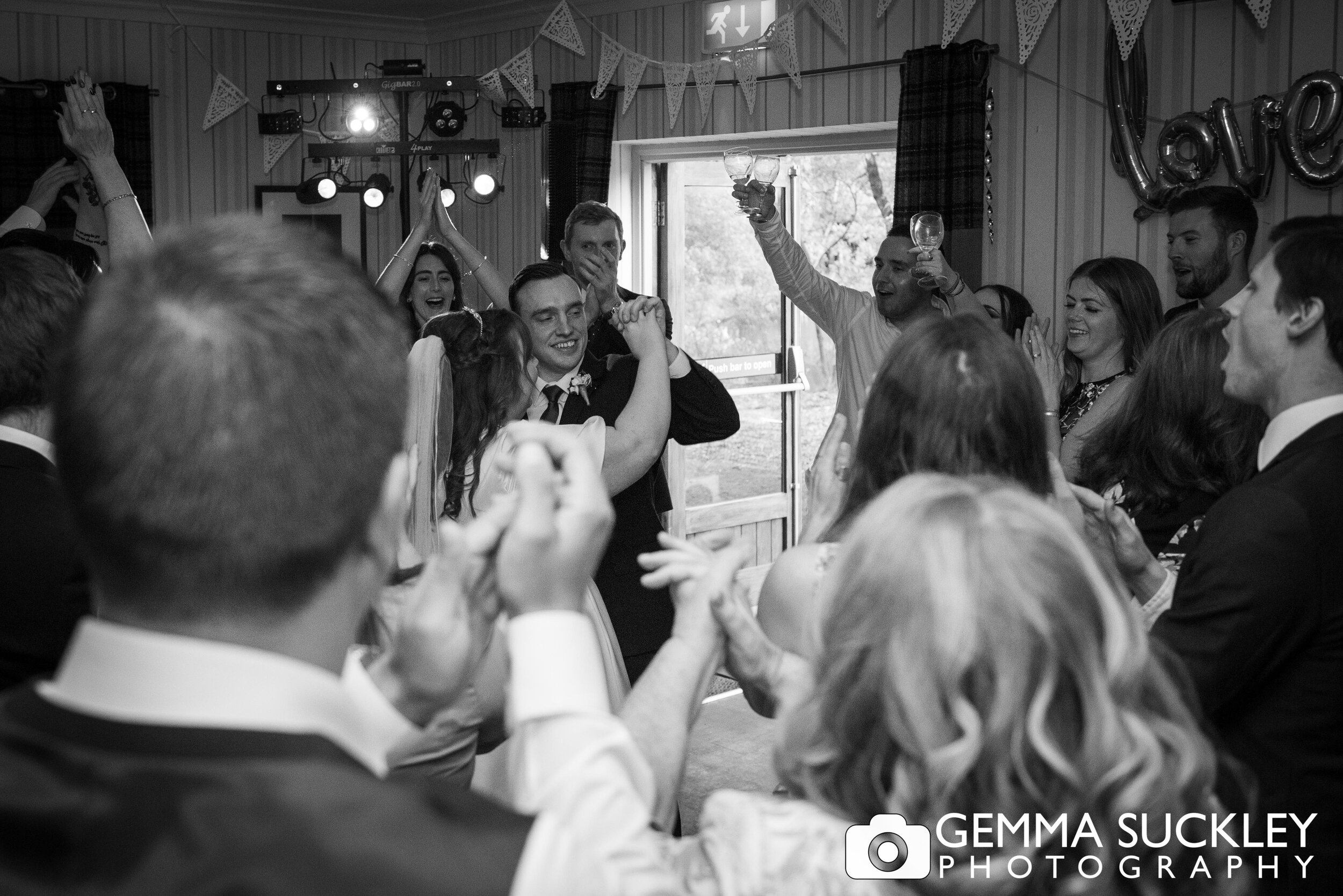 wedding guest dancing around the bride and groom at the otley chevin hotel wedding