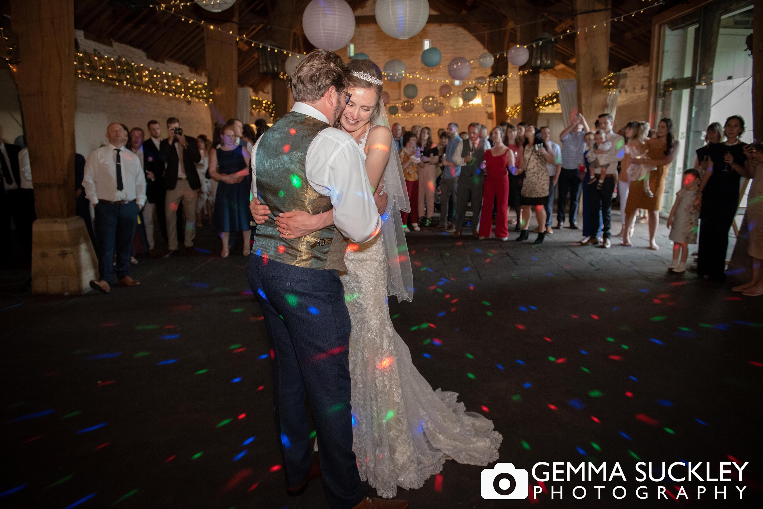 bride and groom dancing their first dance at east riddlesden hall