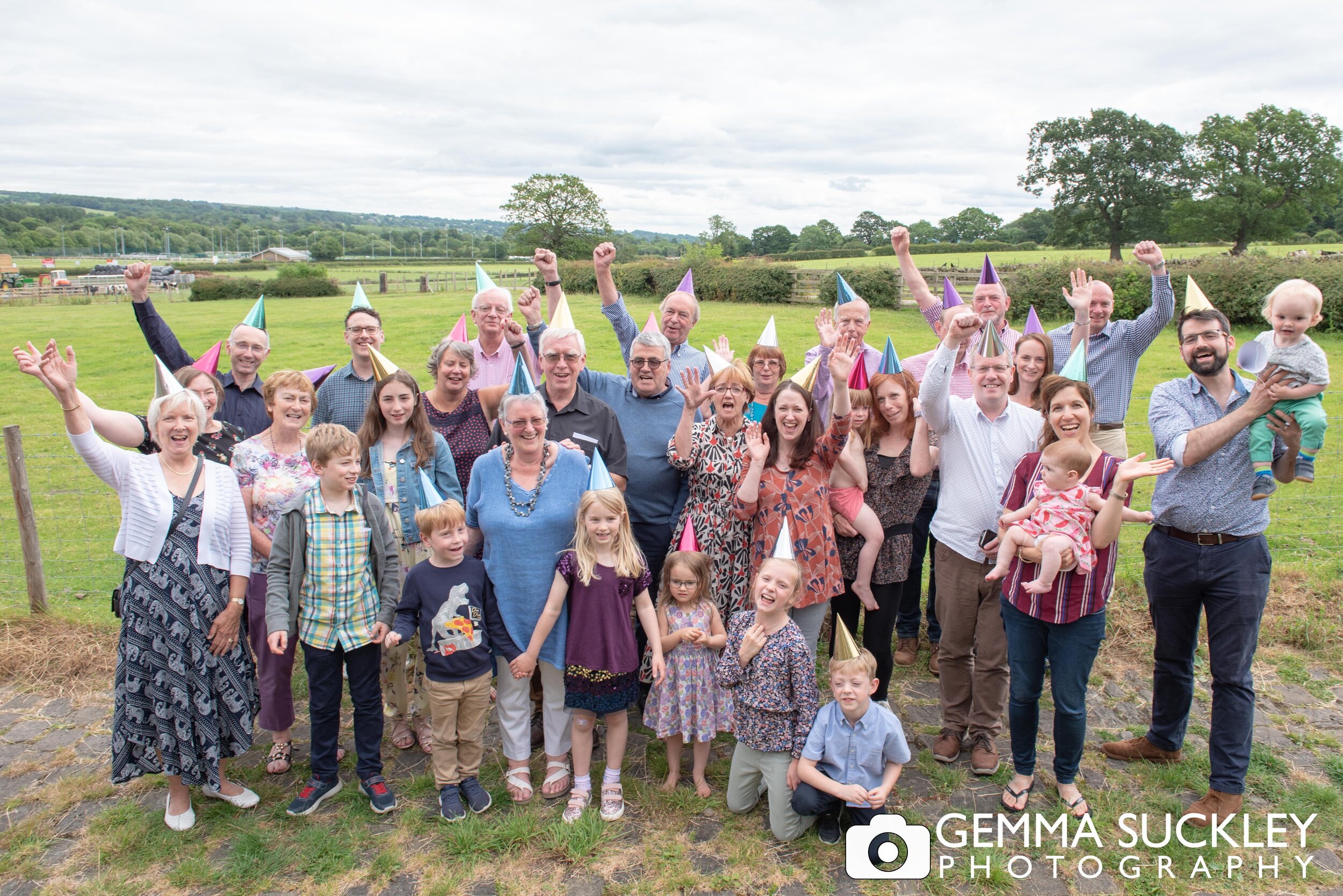 larger family group photo outside spicer manor house