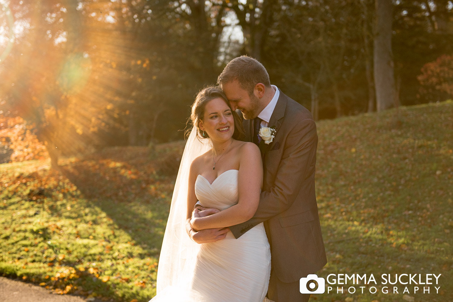 golden hour photo of a bride and groom hugging at the coniston hotel