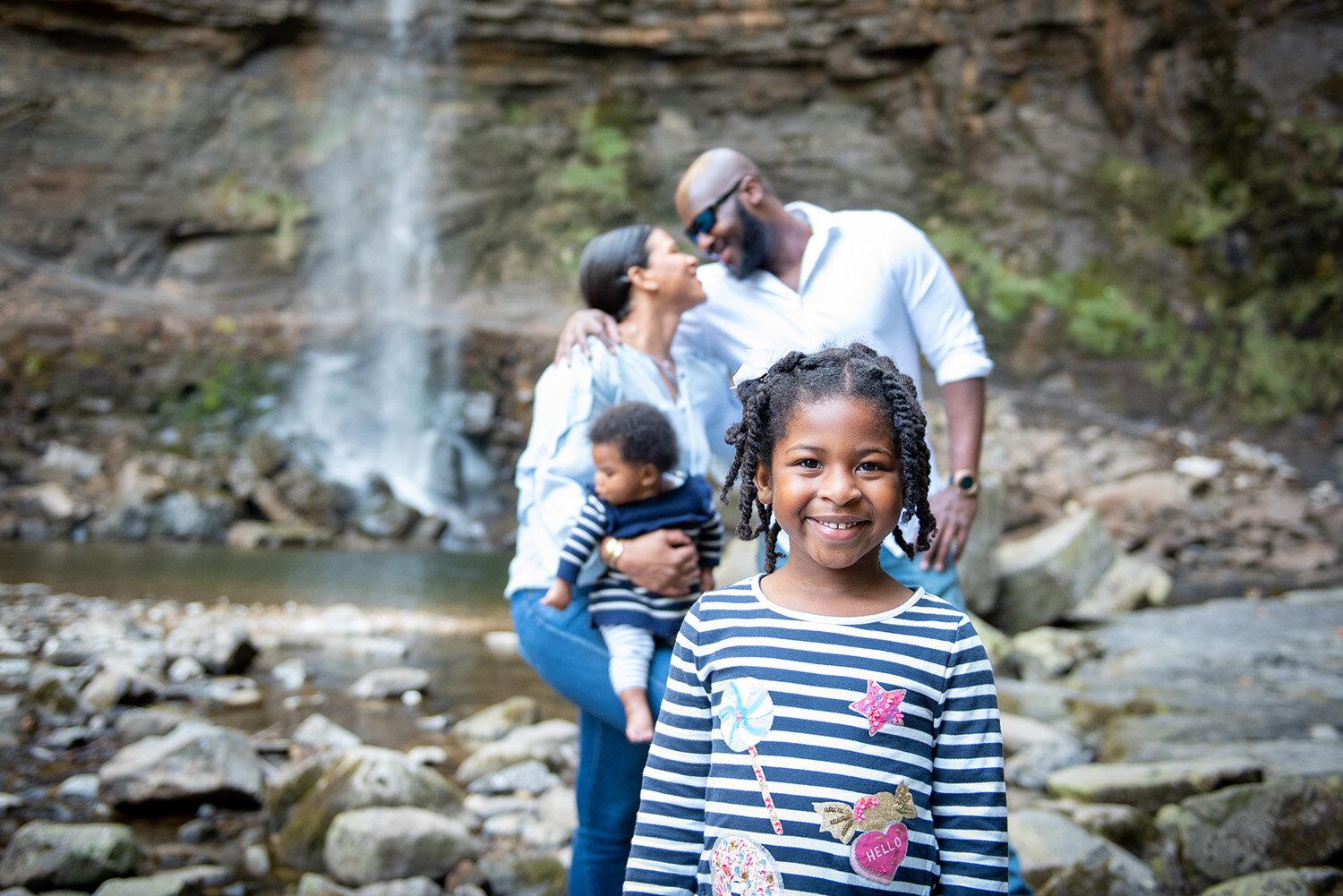 family photo with hardraw force photo in the background