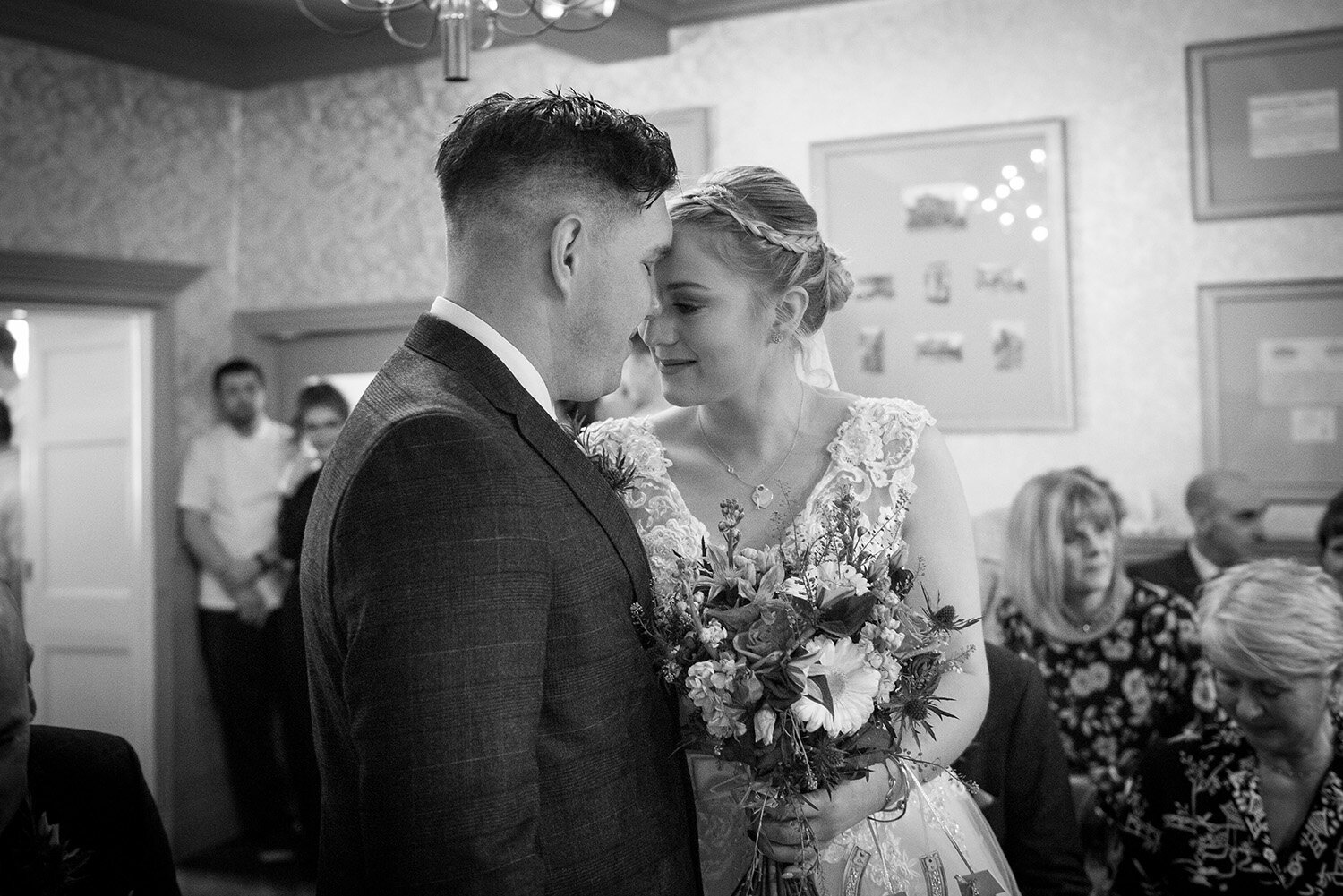 bride and groom emotional just after wedding vows at grassington house