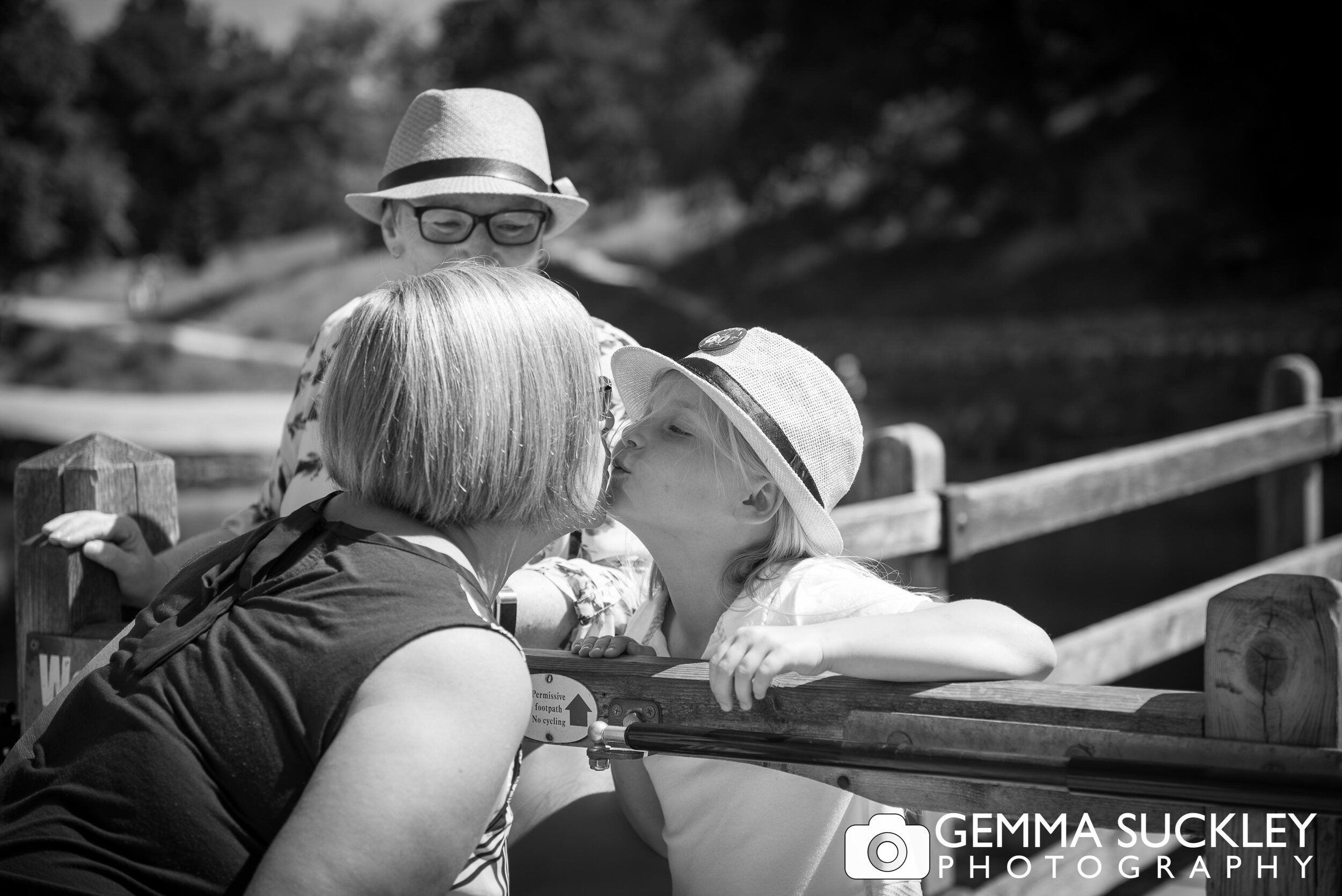 a little girl kissing her aunt during a photo shoot at bolton abbey 