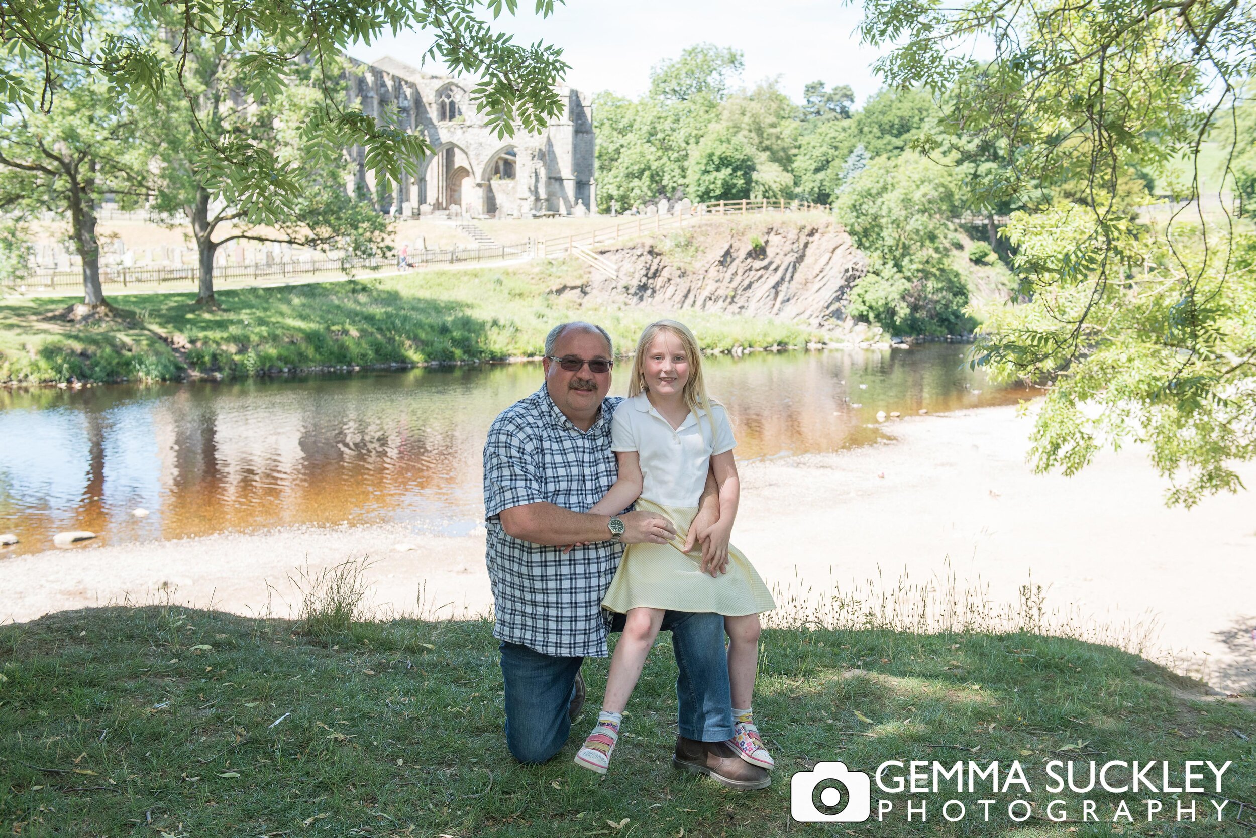 family photo with bolton abbey ruin in the background