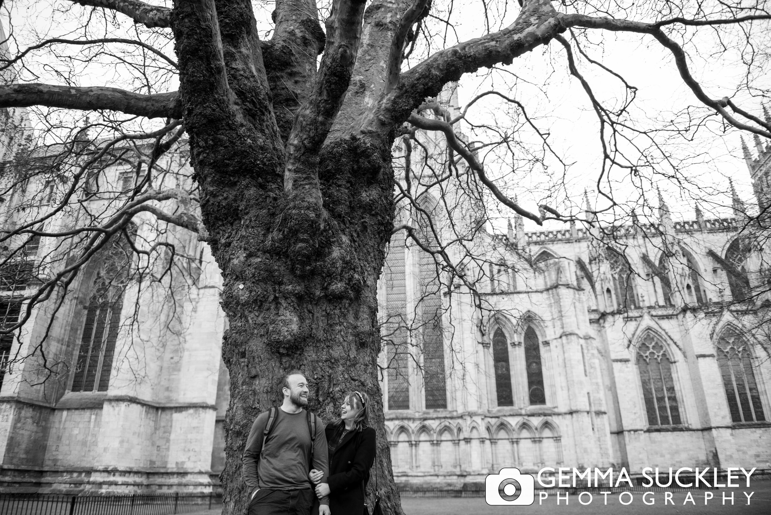 black and white photo of a couple outside york minister