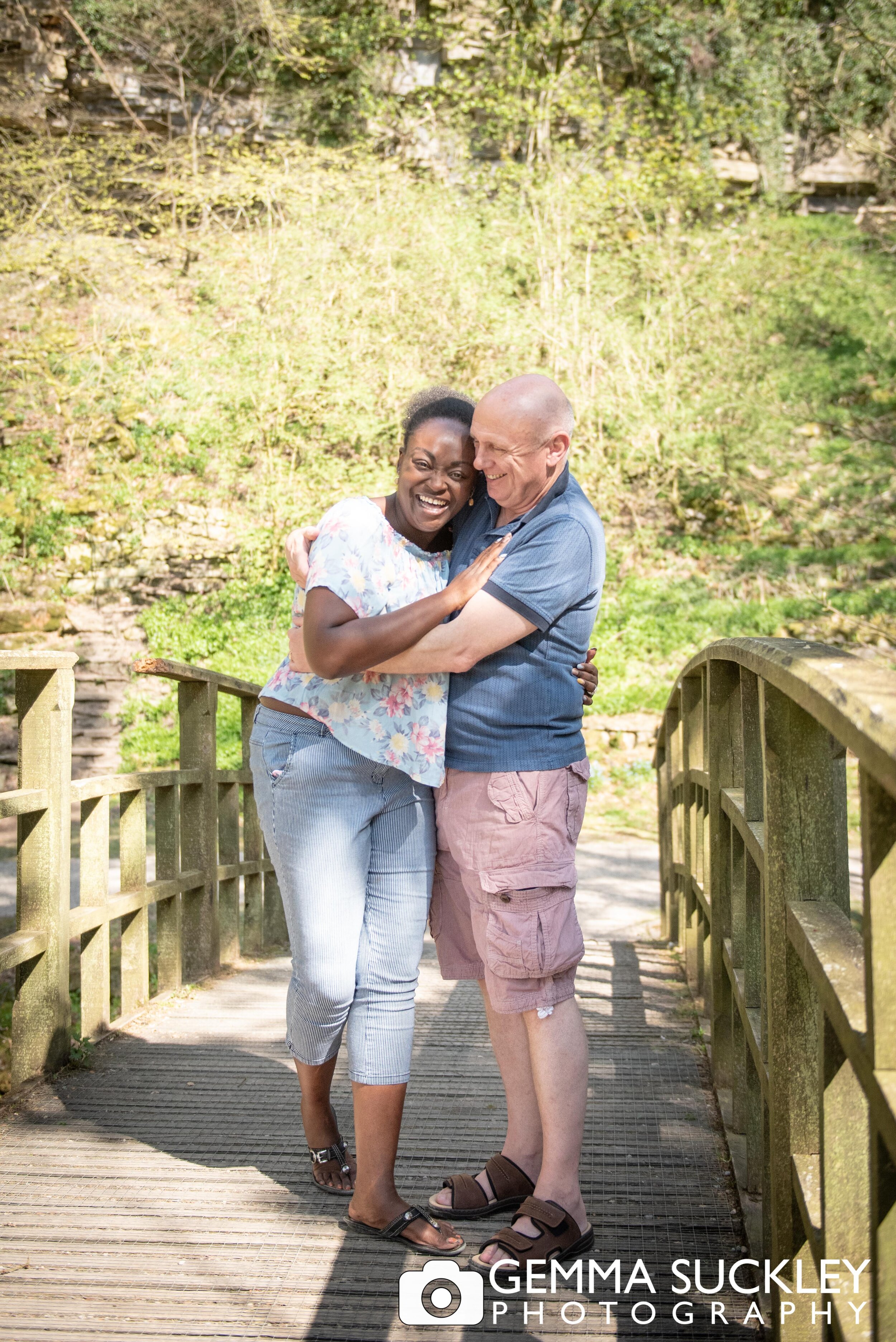natural family photo of couple hugging by skipton photographer