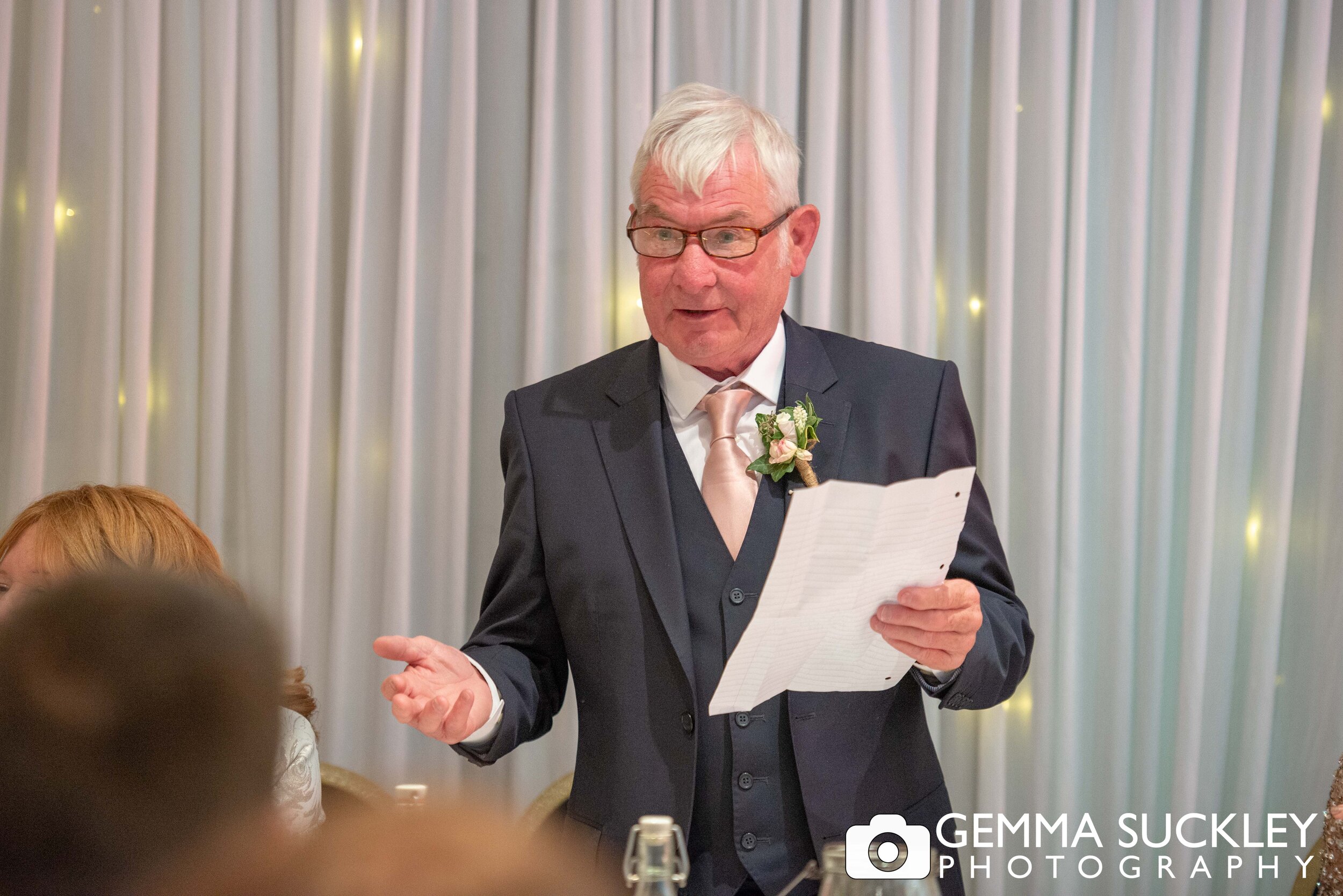 close up photo of the father of the bride making his speech