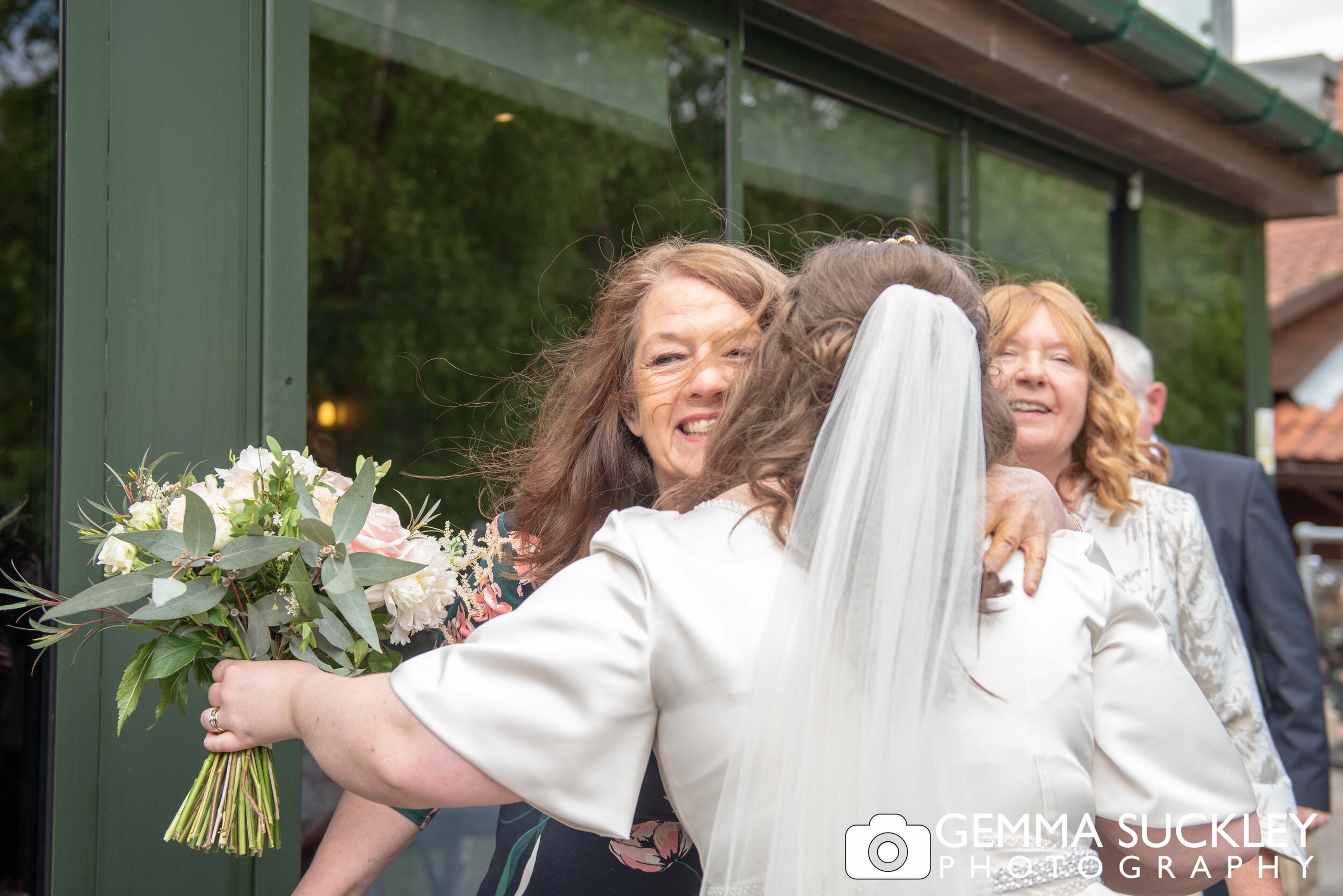 bride hugging guests arriving at otley chevin hotel