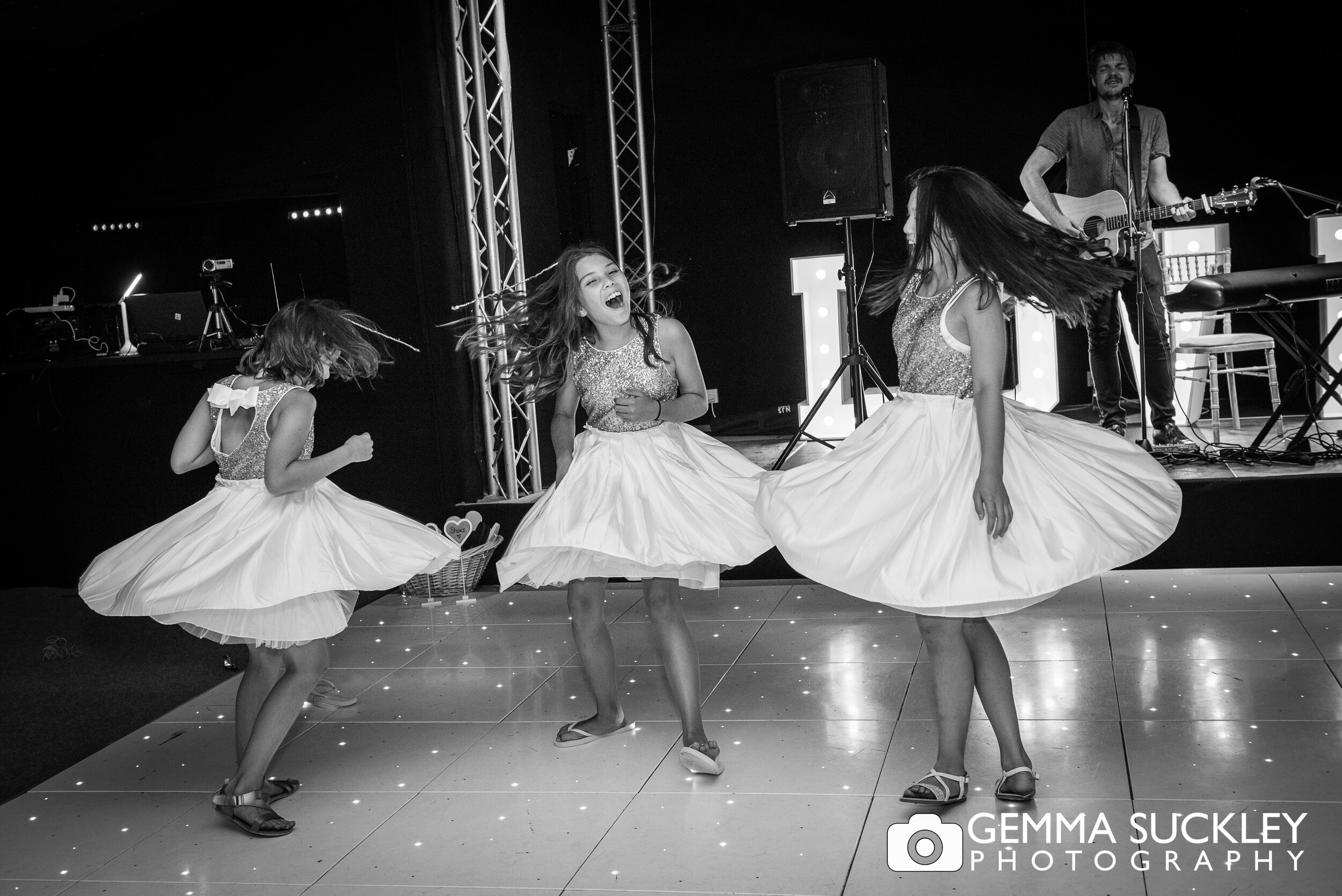 children spinning on the dance floor at the moorlands inn wedding
