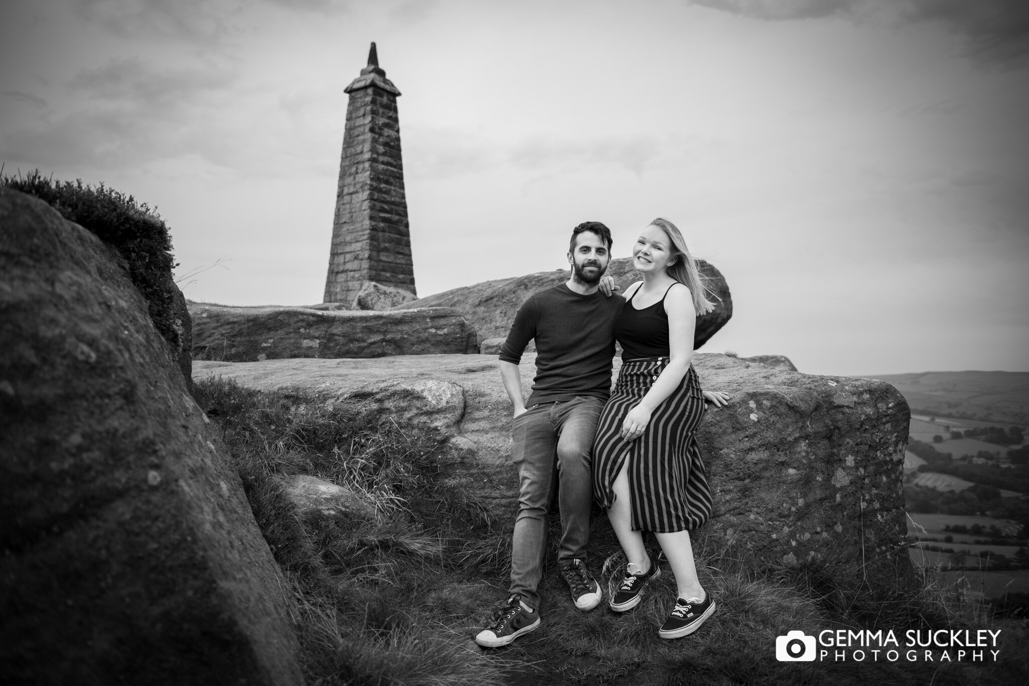 black and white engagement photo of a couple at cowling pinnacle