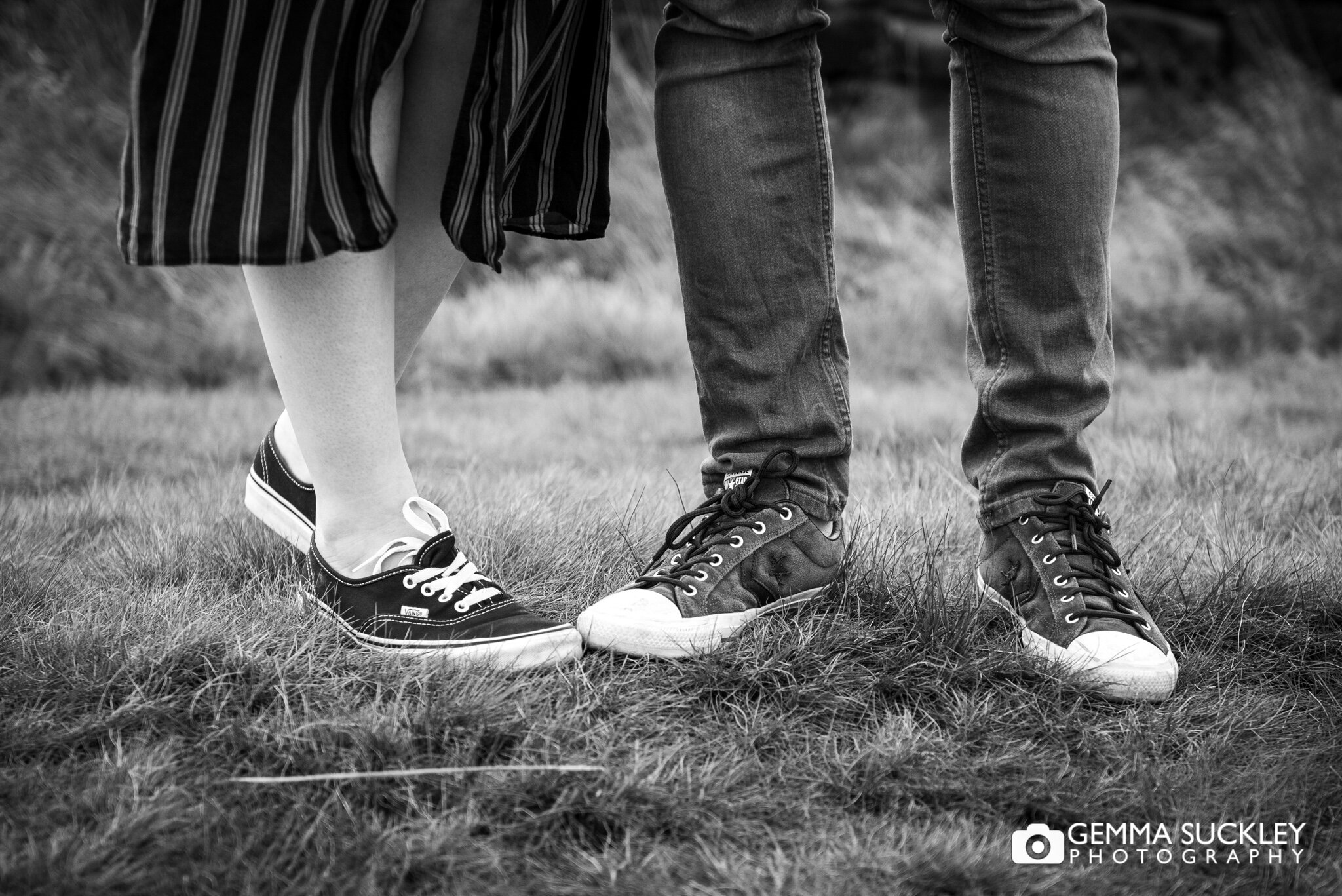 a close up photo of a couples trainers 