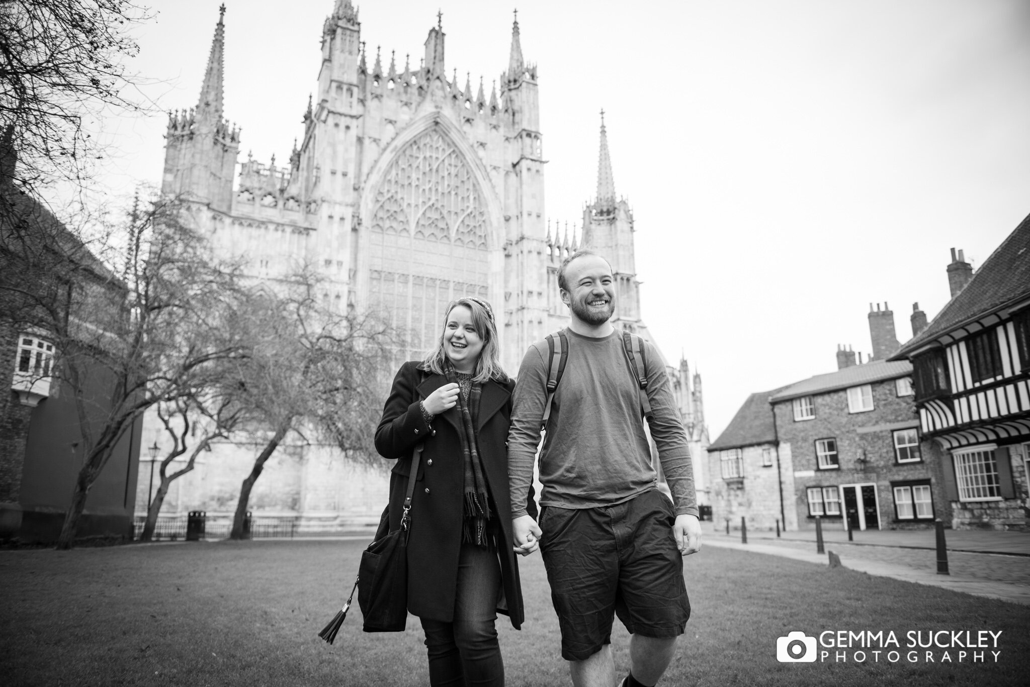 an engaged couple during their photoshoot at york minister 