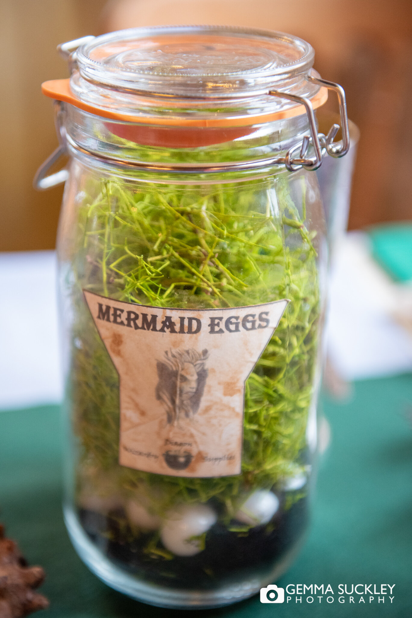 a jar of mermaid eggs at a harry potter themed wedding