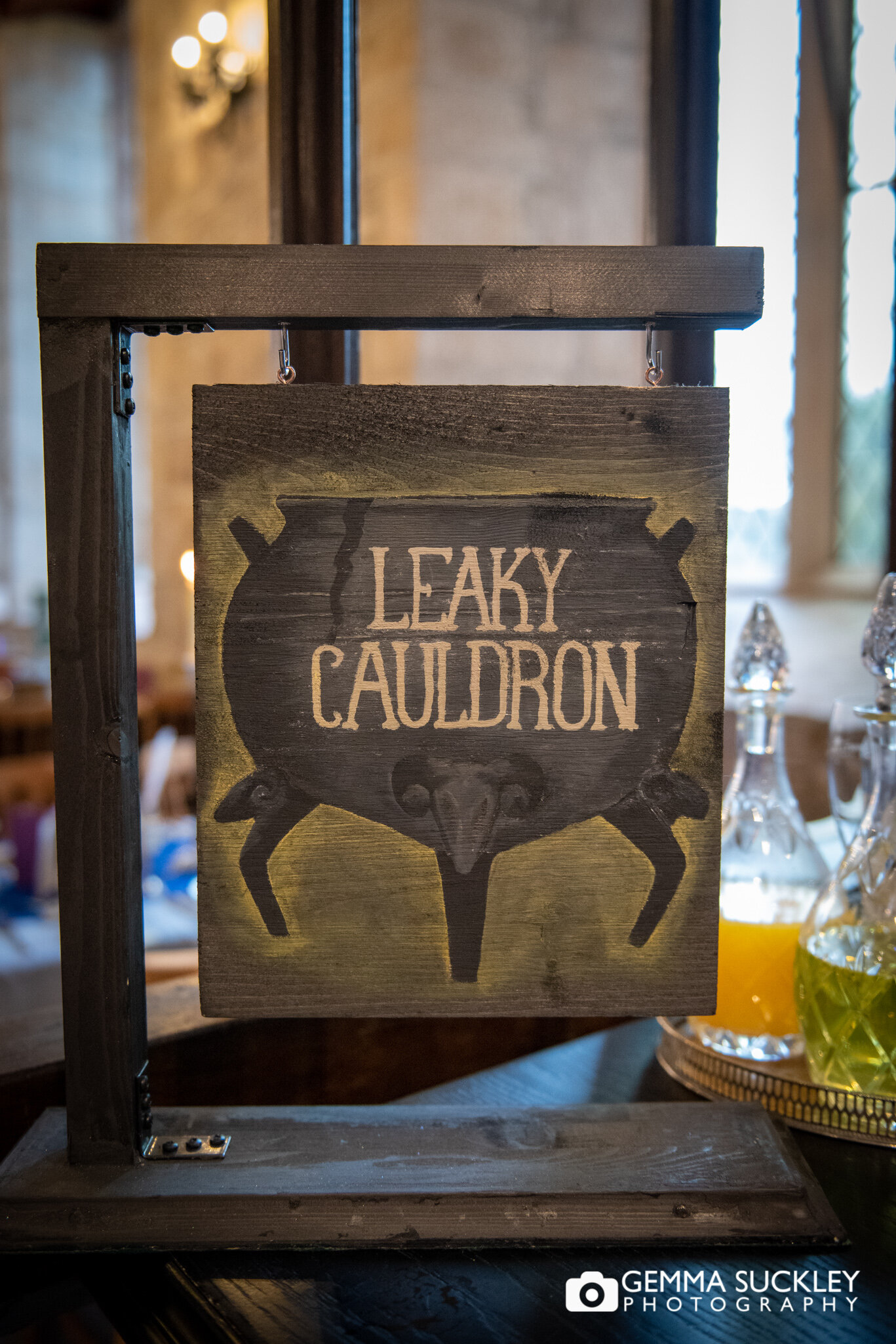 the leaky cauldron sign at the priest house wedding