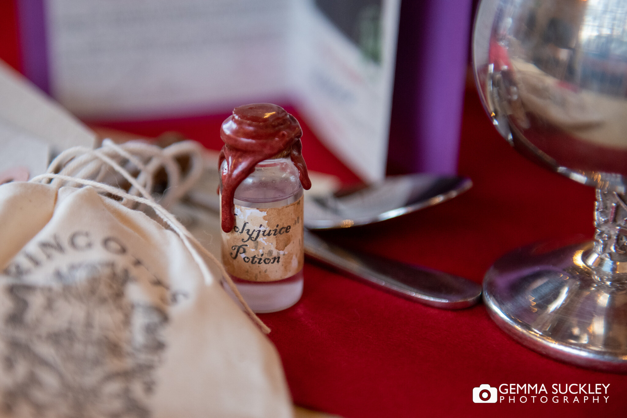 polyjuice table detail at a harry potter themed wedding at the priest house