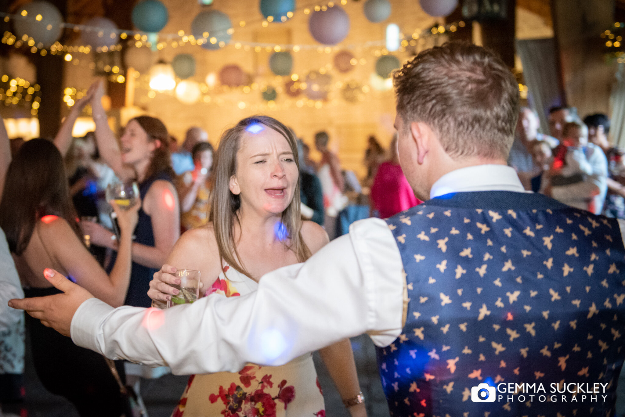 wedding guest dancing at east riddlesden hall