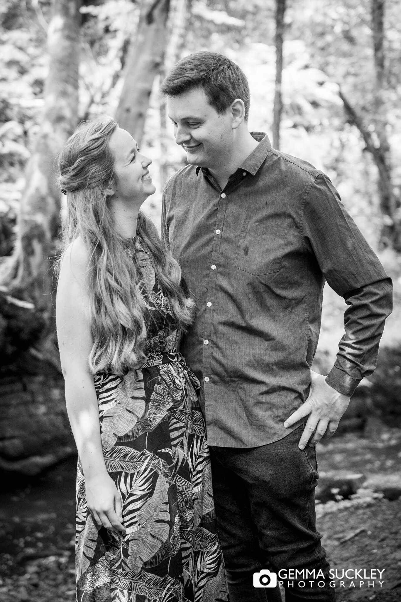 black and white photography of an engaged couple