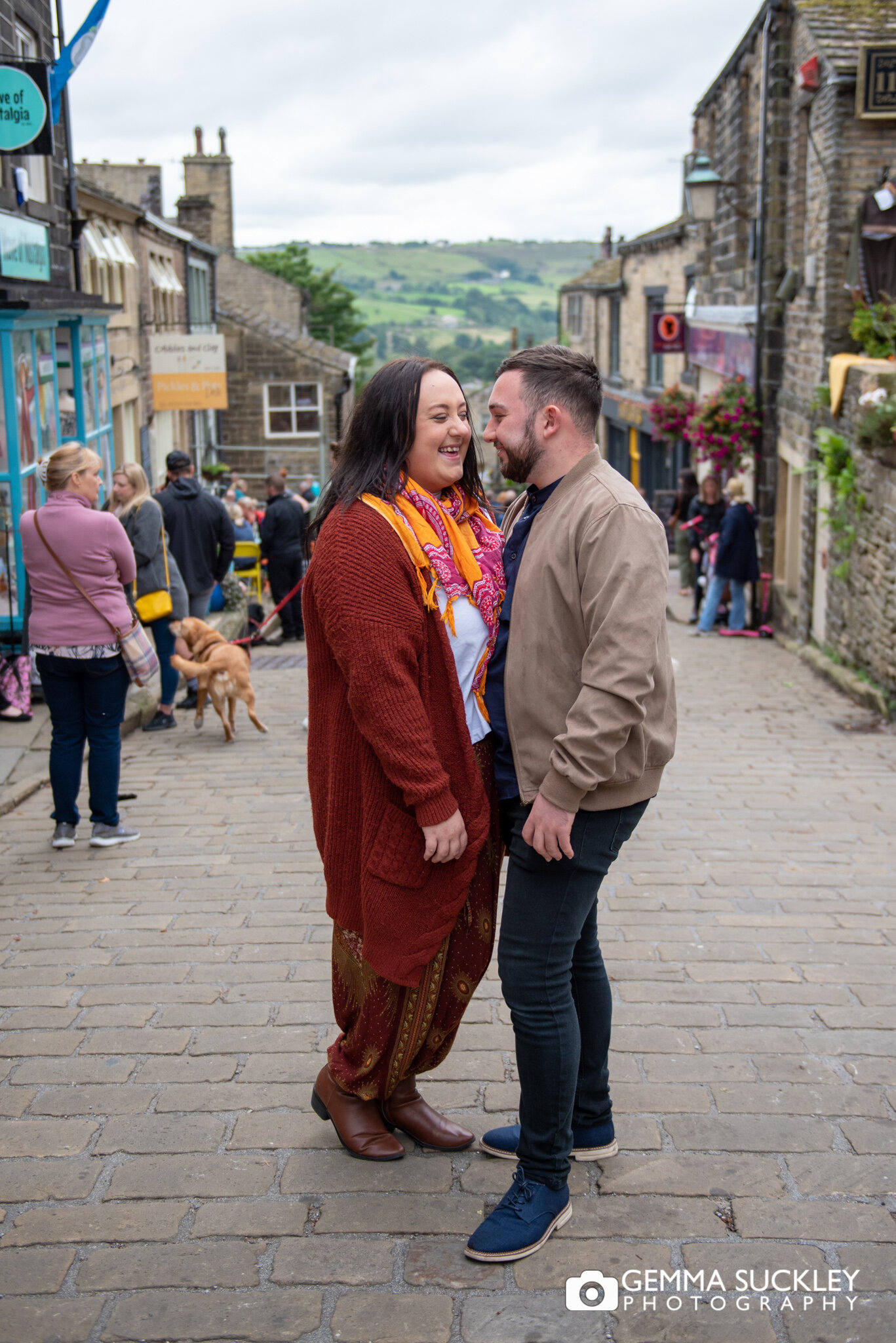 a kissing couple on main street in haworth
