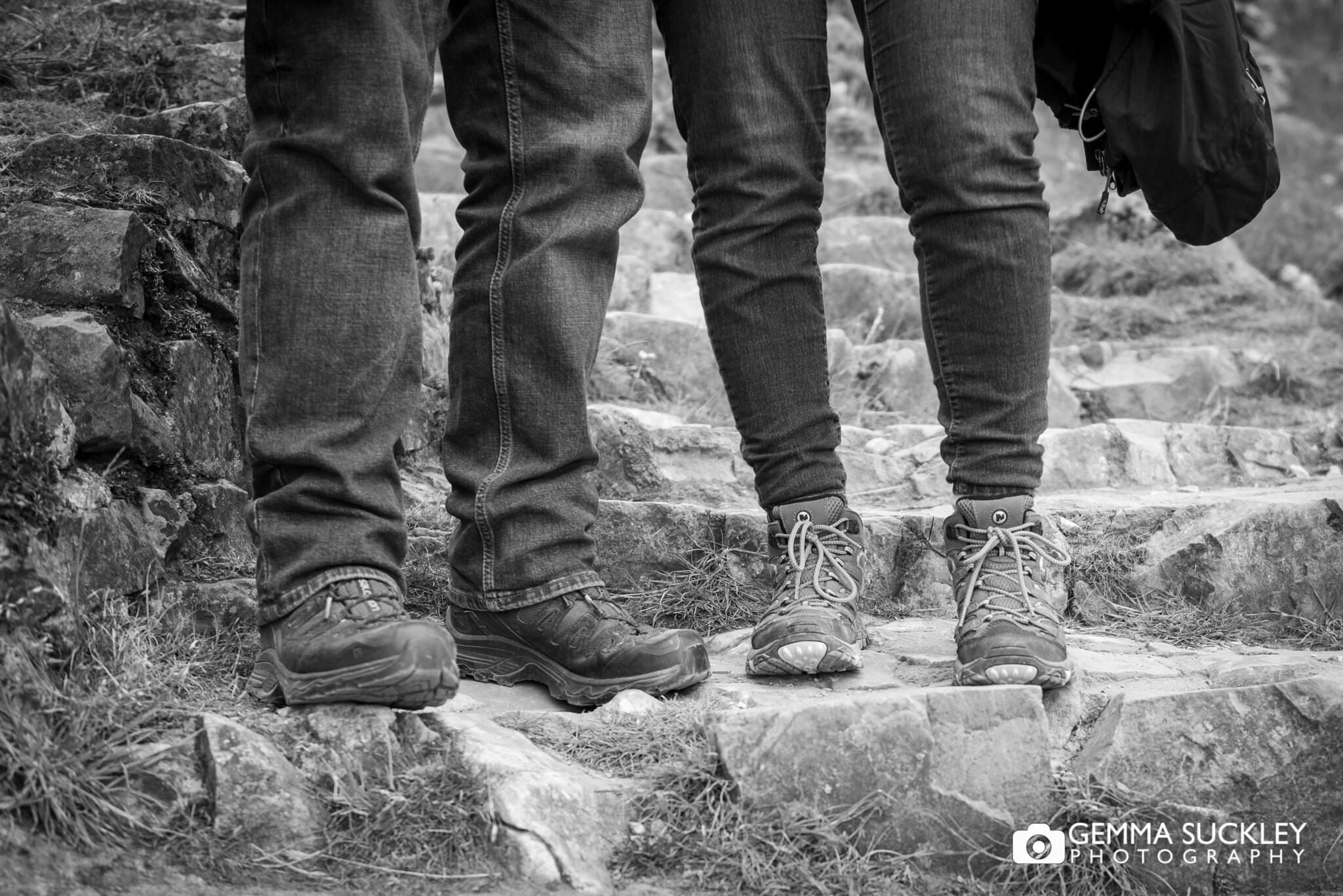close up photo of a walking boots on the steps at malham cove