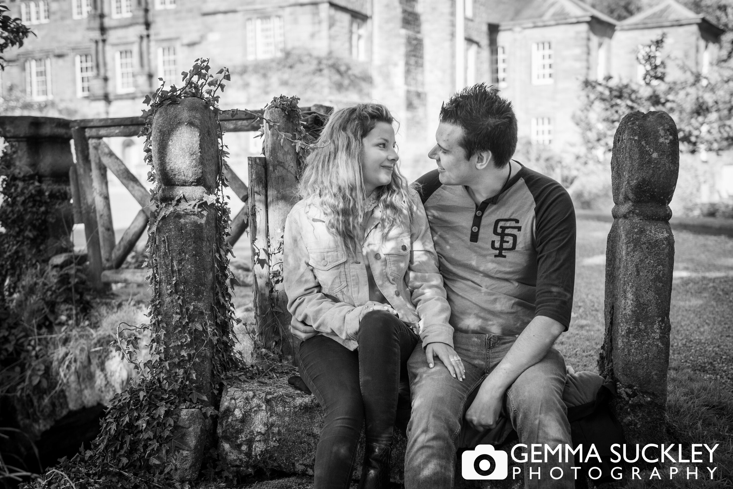 black and white engagement photo of a couple at browsholme hall