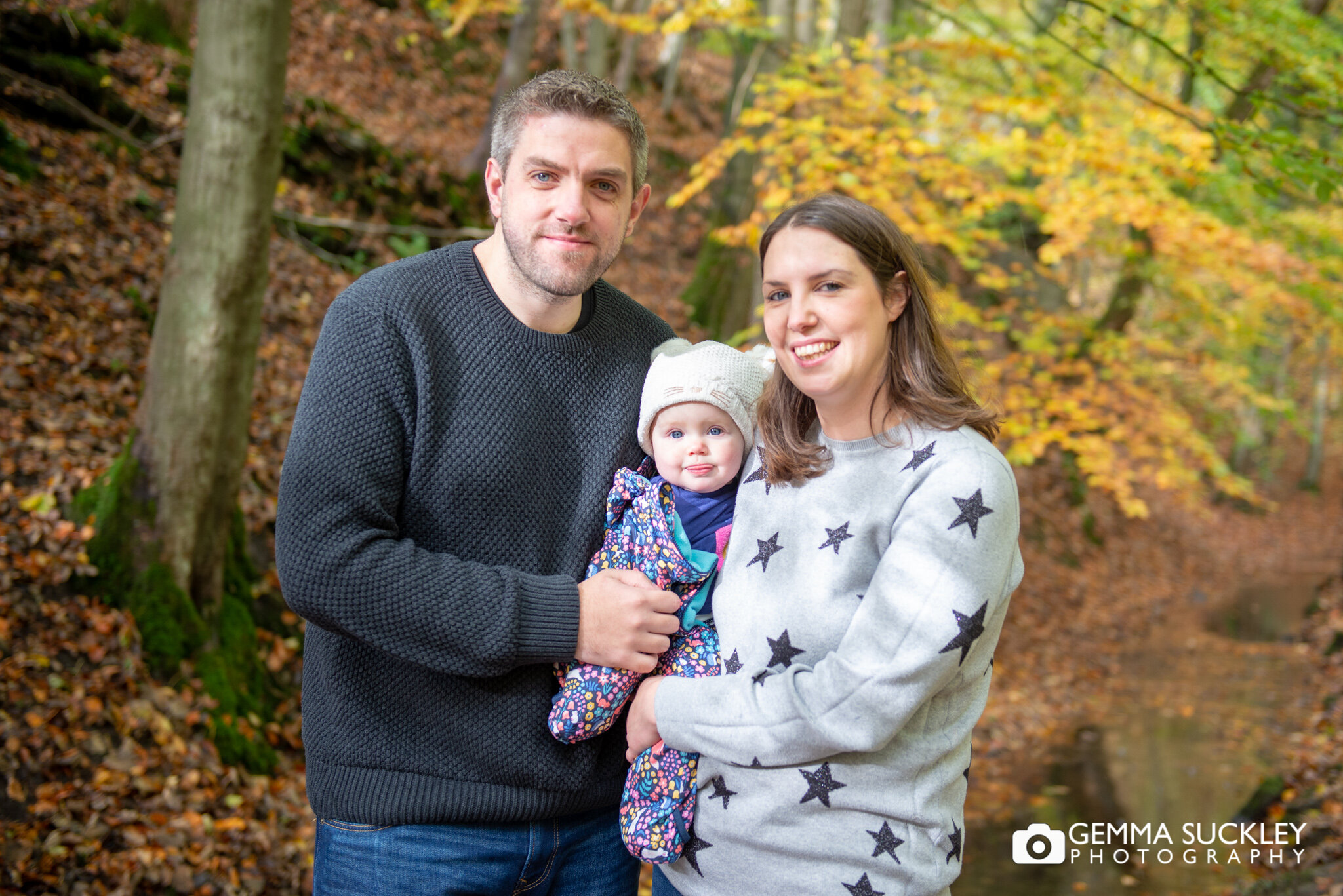 a autumnal photo shoot of a family in skipton wood