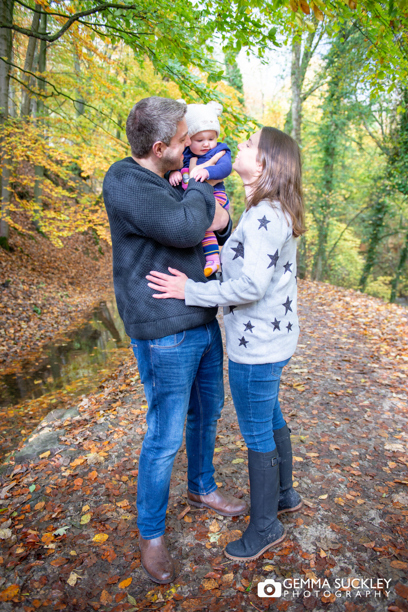 a autumnal photo of a family in skipton wood