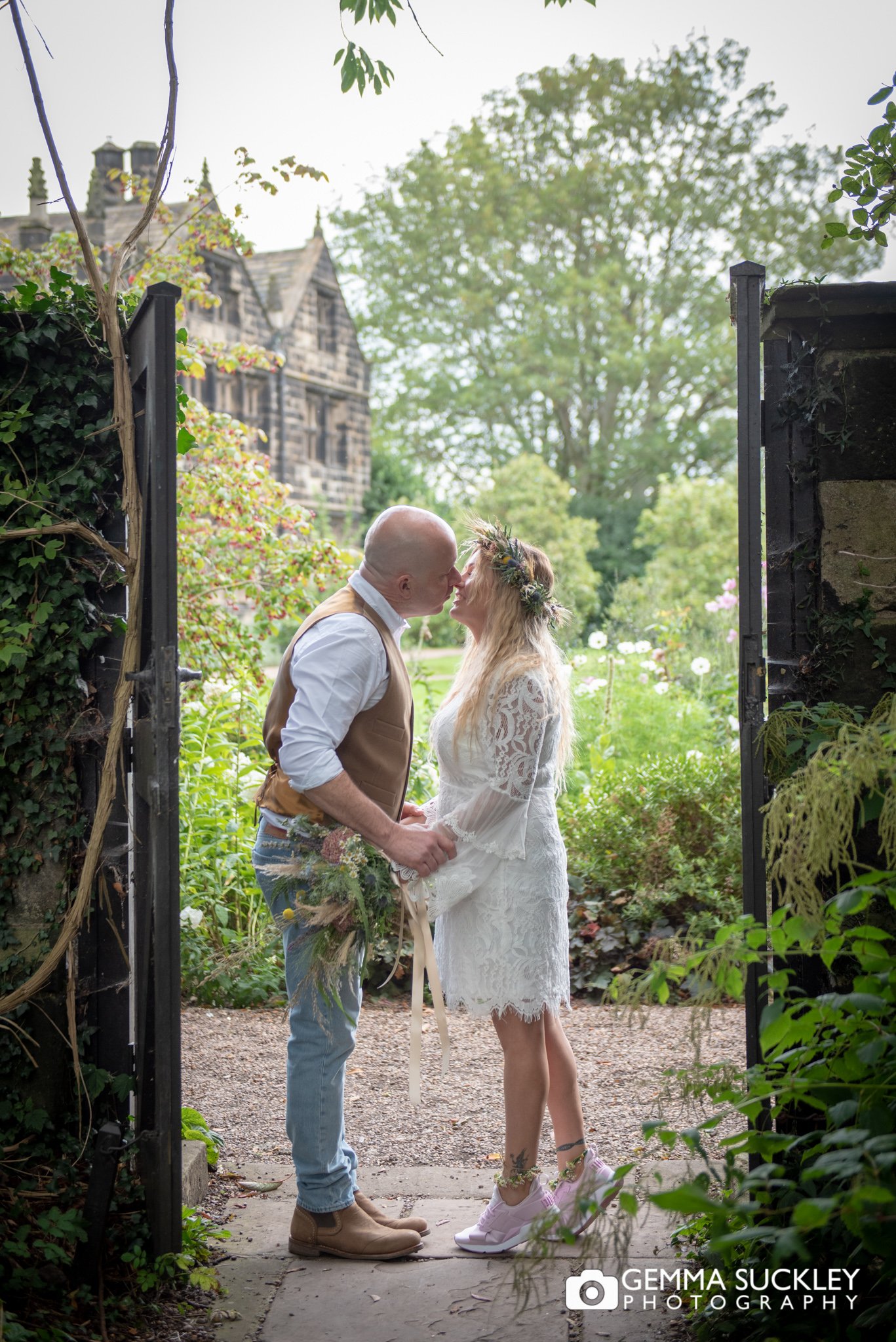 romantic wedding photo of the married couple at east riddlesden hall