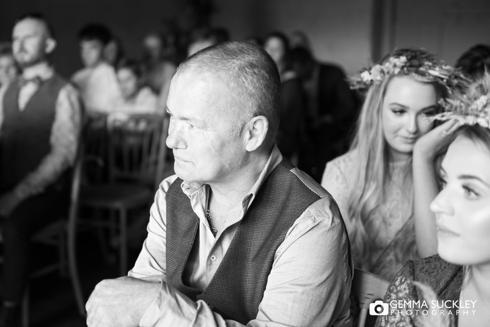 the grooms father looking tearful at east riddlesden hall wedding