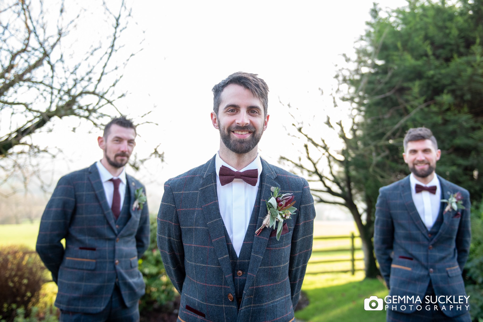 formal photo of the grooms men outside the shireburn arms