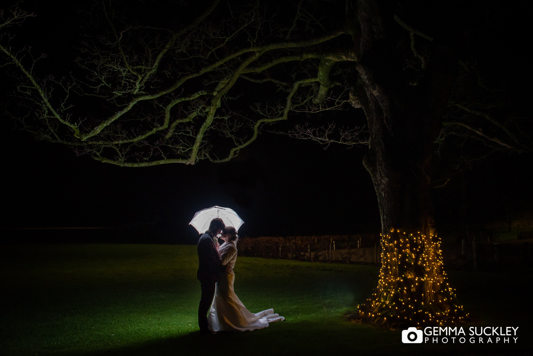 night photography of the bride and groom outside the coniston hotel