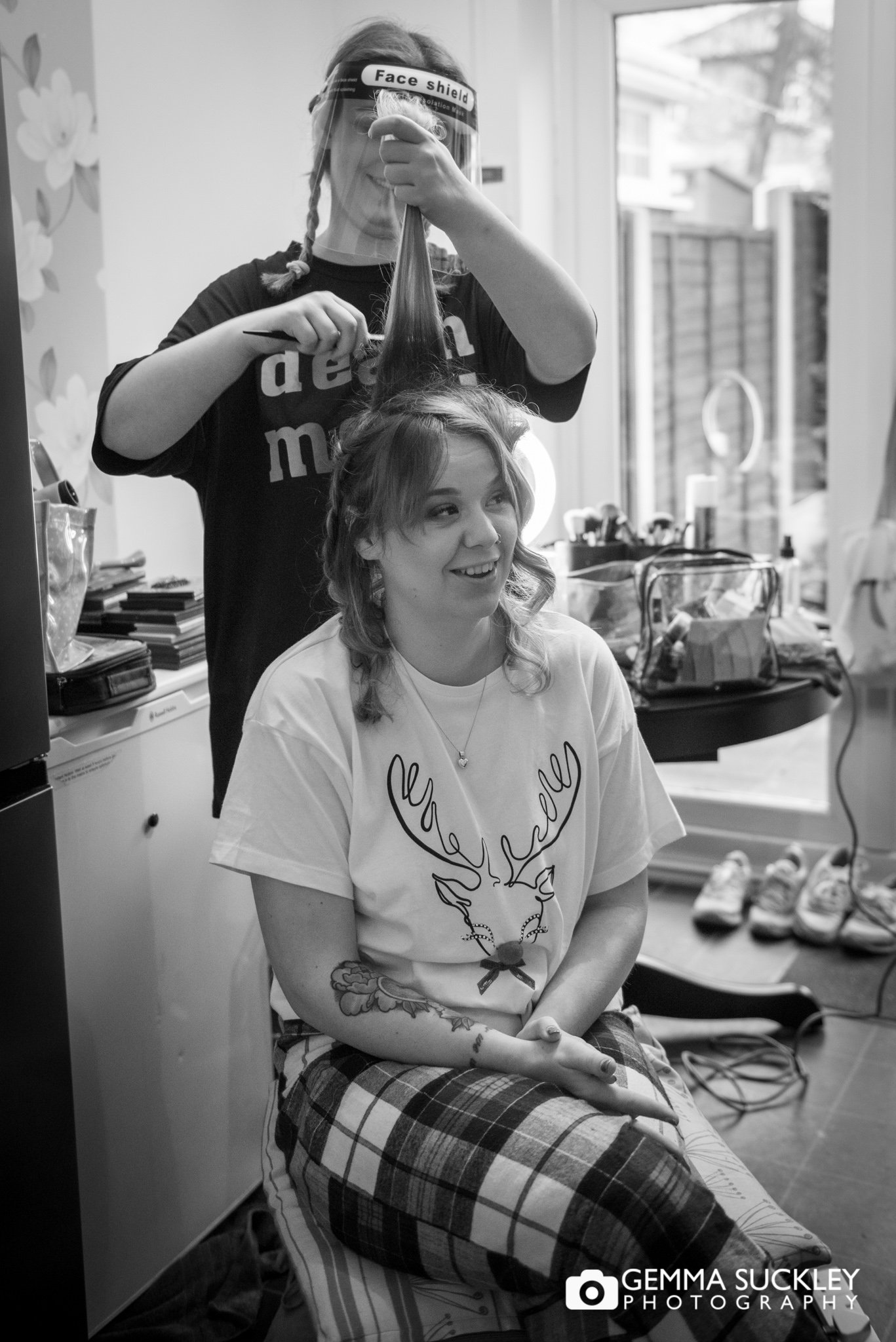 bride to be getting her hair done