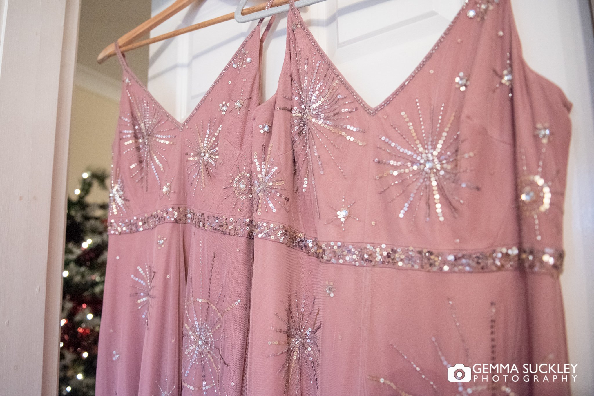 Pink bridesmaid dress hung up