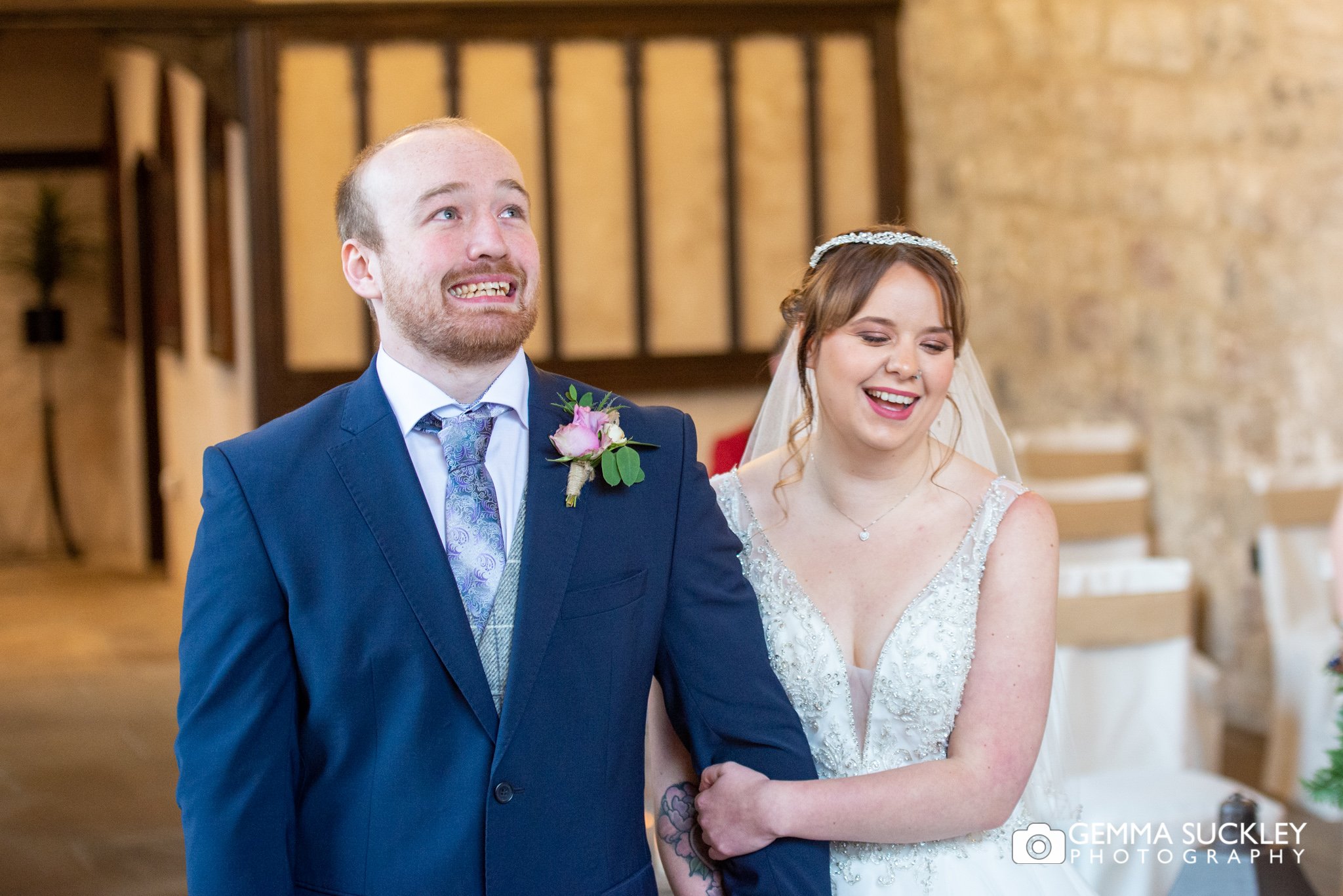 a wedding photo of the bride and grooms facial expression at the priests house barden 