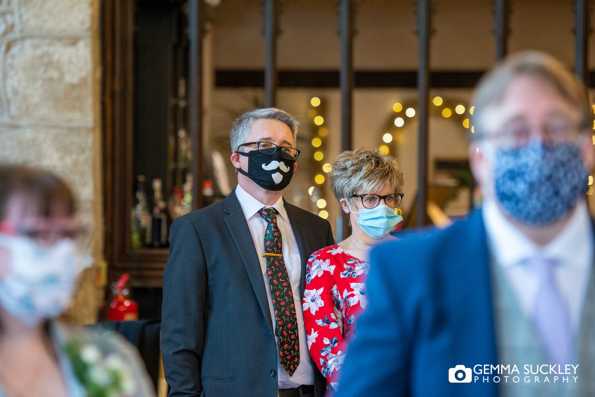 wedding photo of the guests wearing masks at the priests house bolton abbey