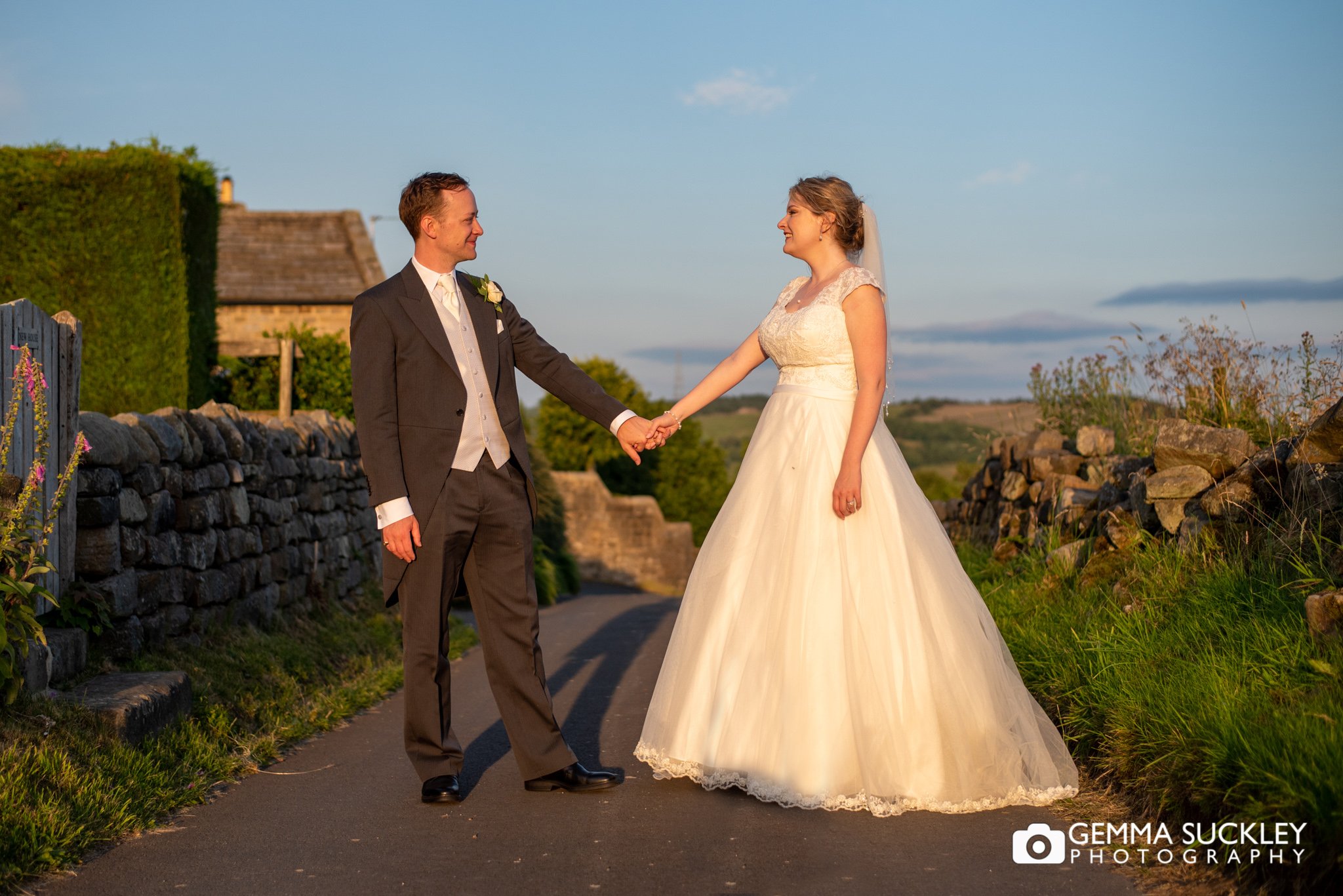 wedding photo of the bride and groom at golden hour in  timble village