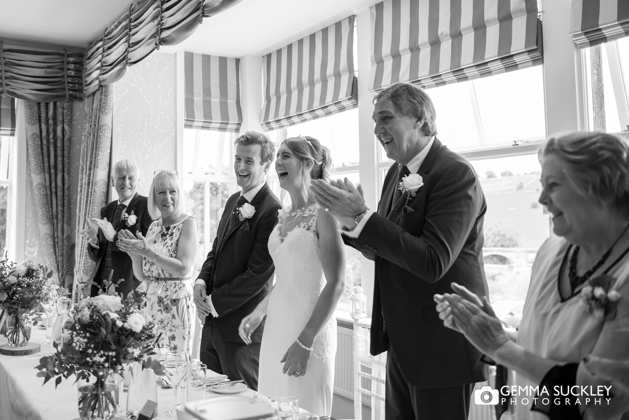 top table laughing and clapping at the devonshire fell